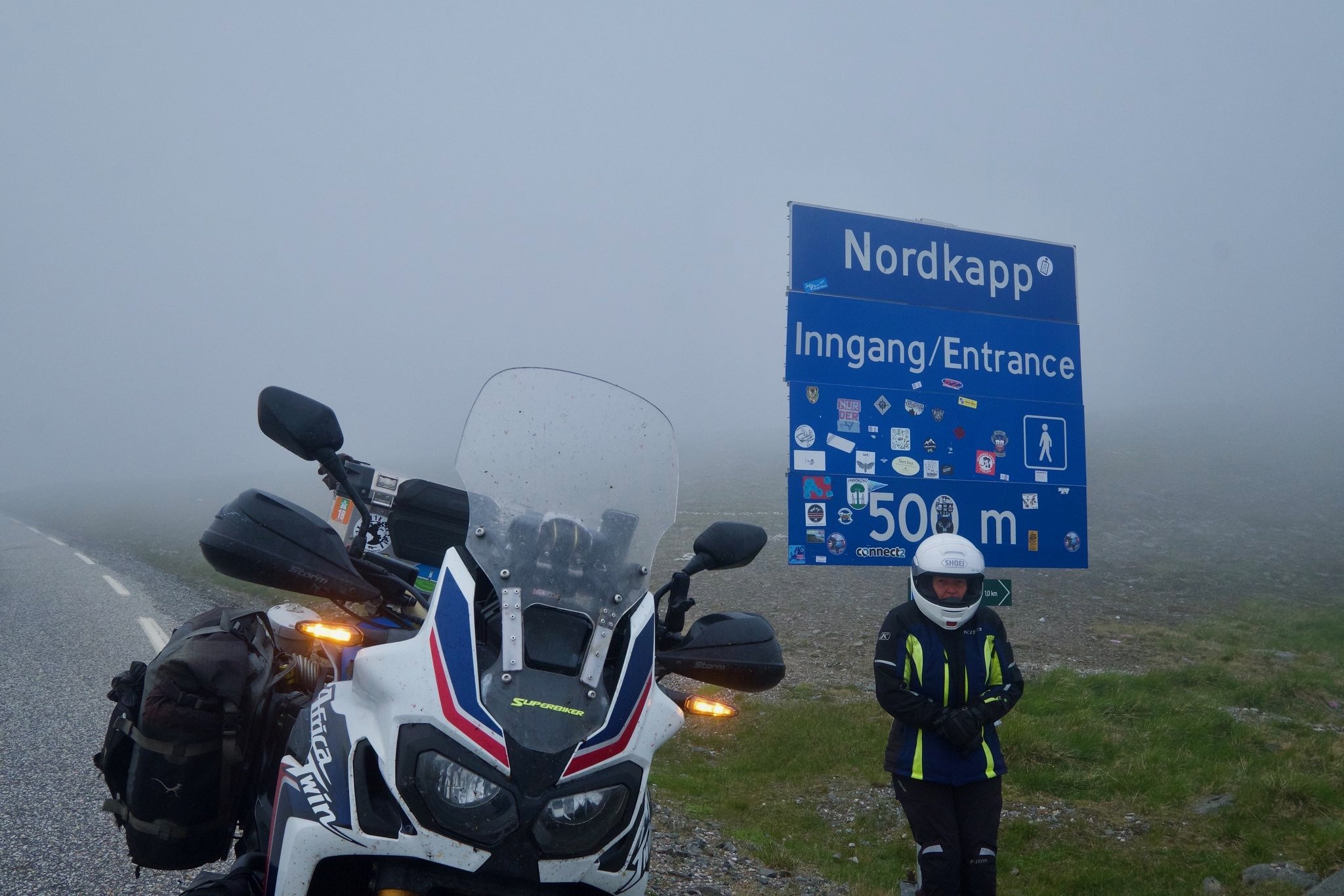  Cold at Nordkapp. Graeme and Katrina visited there before in 2002 on a sunny day when they travelled up there with their two sons in a clapped out old Peugeot and pop top camper. 