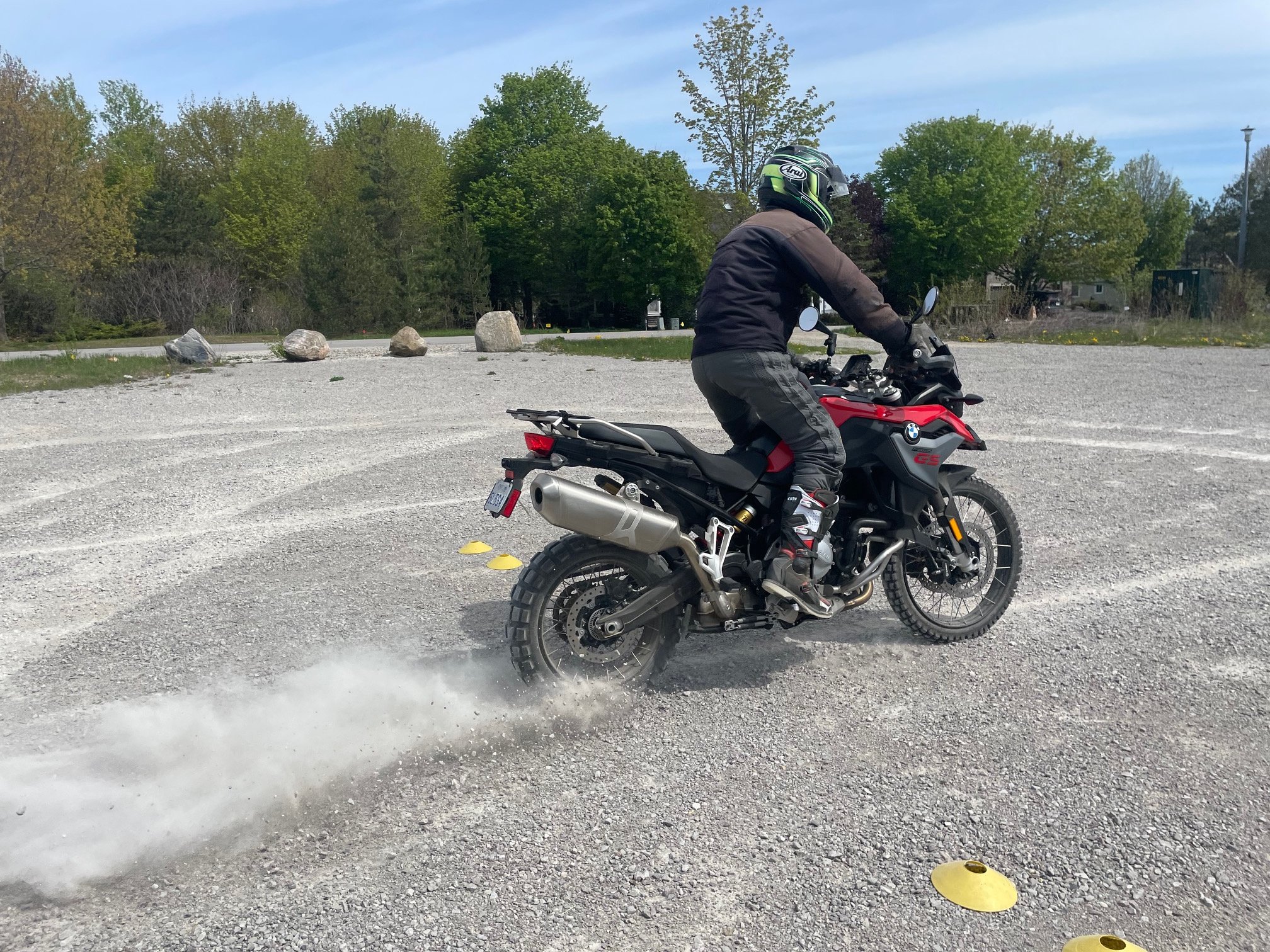  Motorcycle spinning rear tire in sand.   