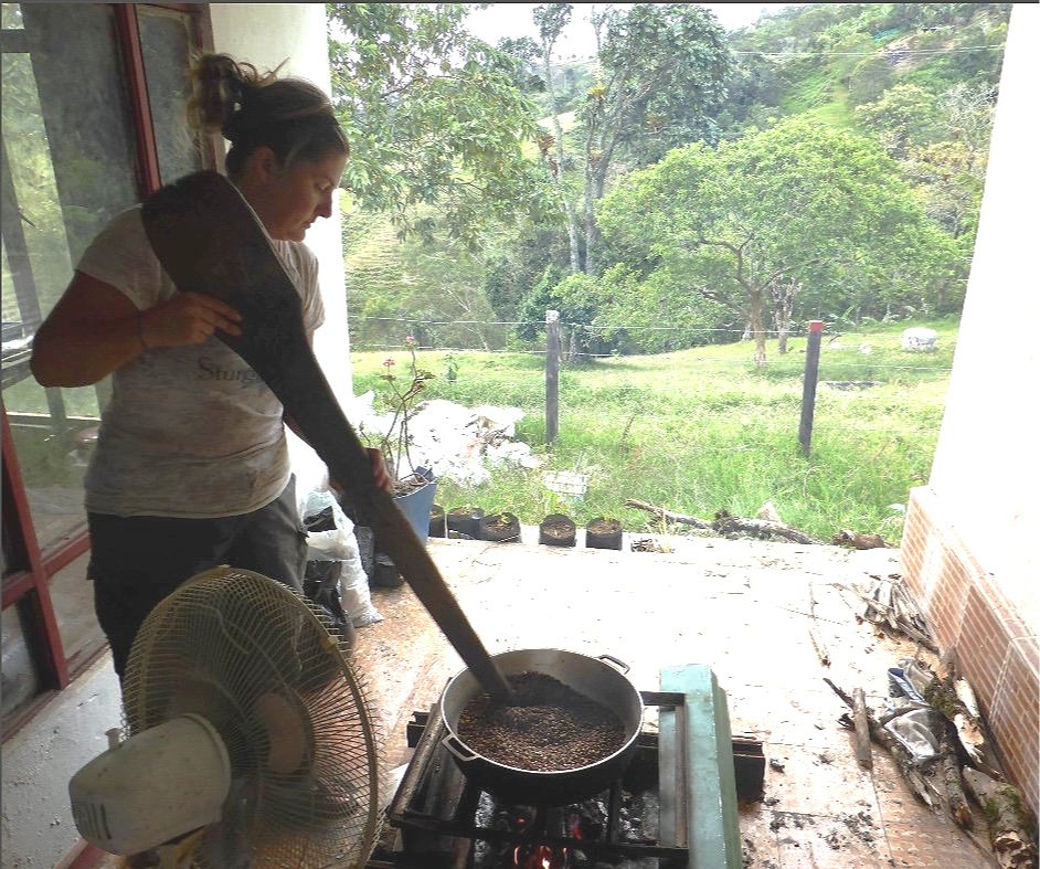  Michelle Lamphere roasting coffee beans while working on a coffee finca in Colombia in July 2014. 