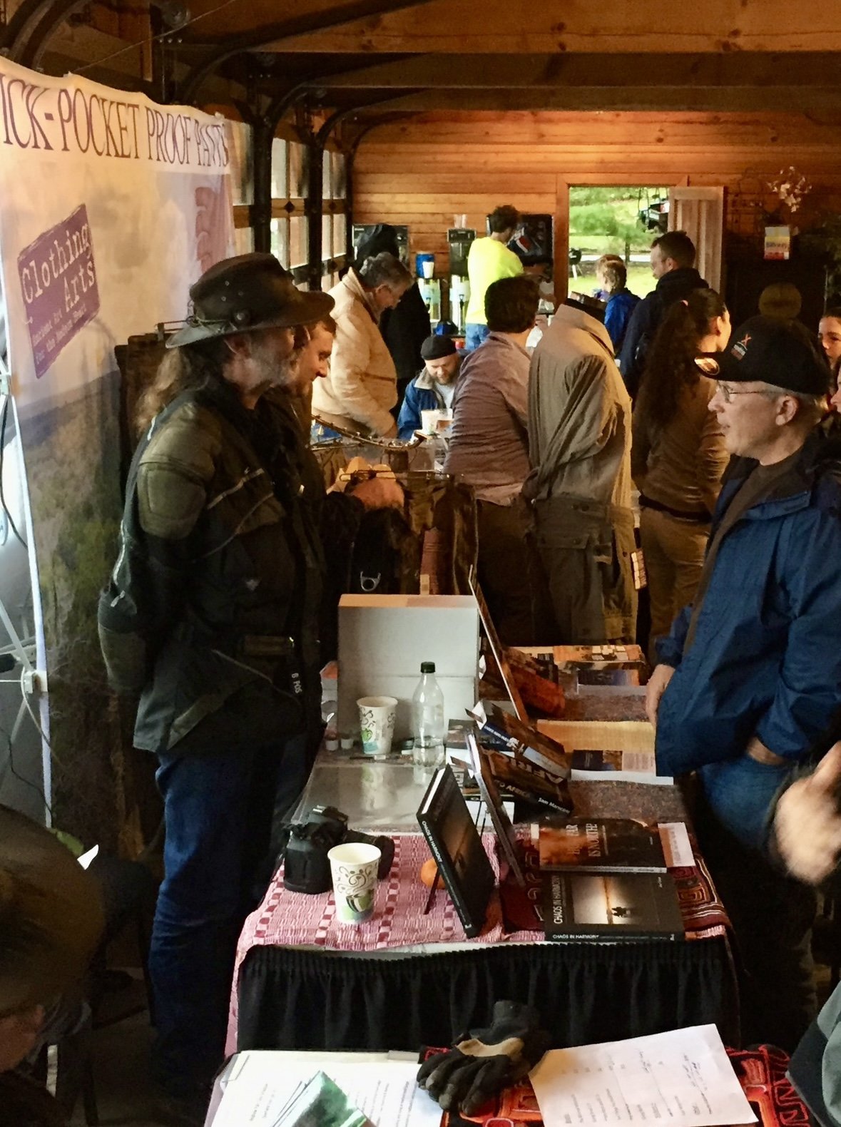  Michelle Lamphere selling her first book at a table next to Sam Manicom and Ted Simon on the other side of him in Autumn 2015. 