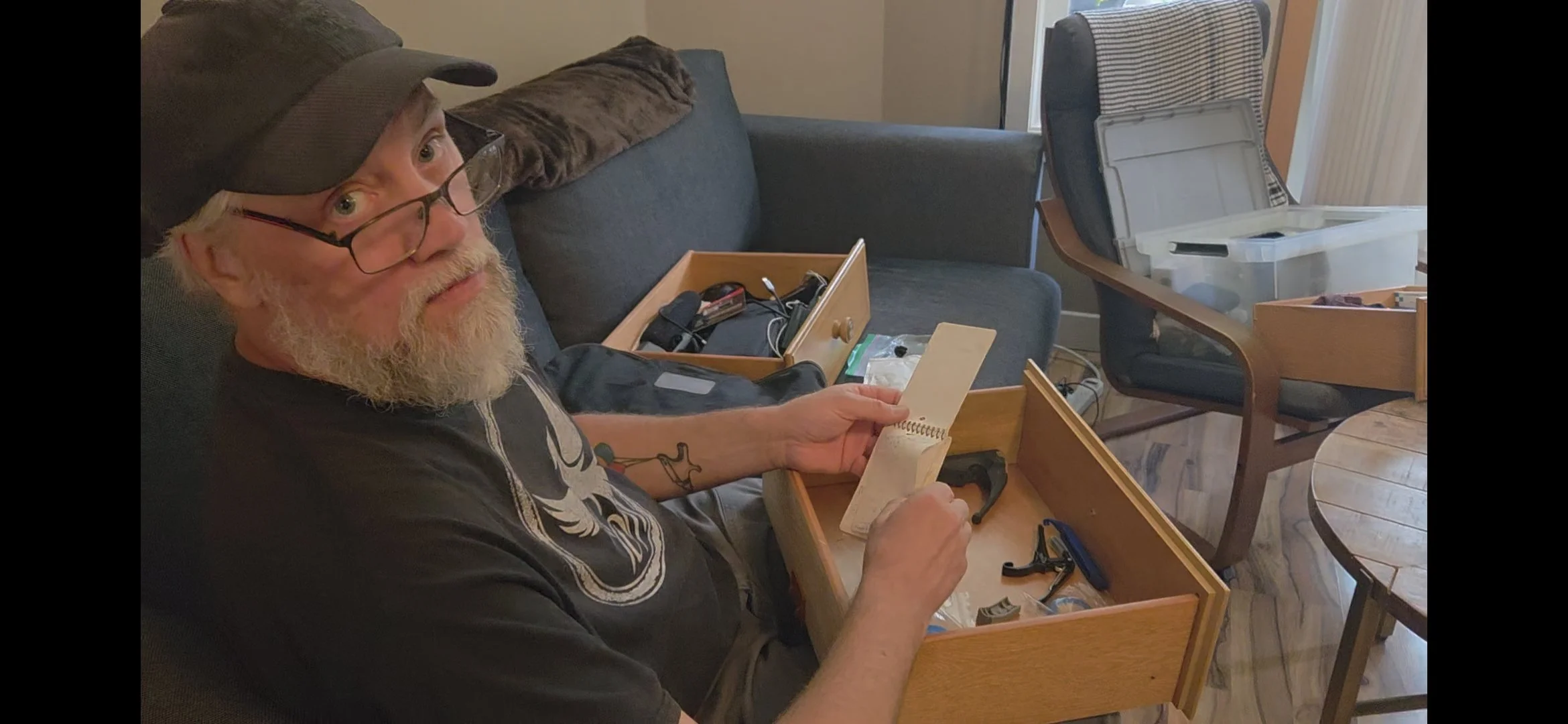  Jeremy saying "I'm ready to cancel this trip" when Elle asks how much fun he's having emptying out dresser drawers in order to move furniture out of their home.    