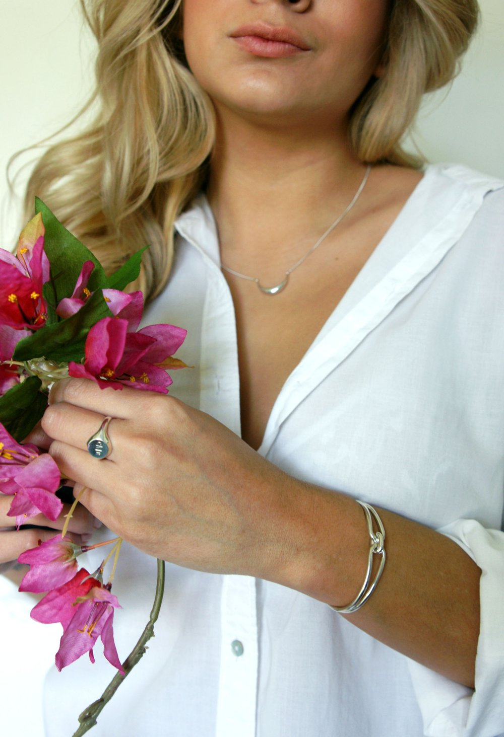 Large Crescent Pendant Necklace, Lug Cuff Bracelet, and Classic Signet Ring with my initials.