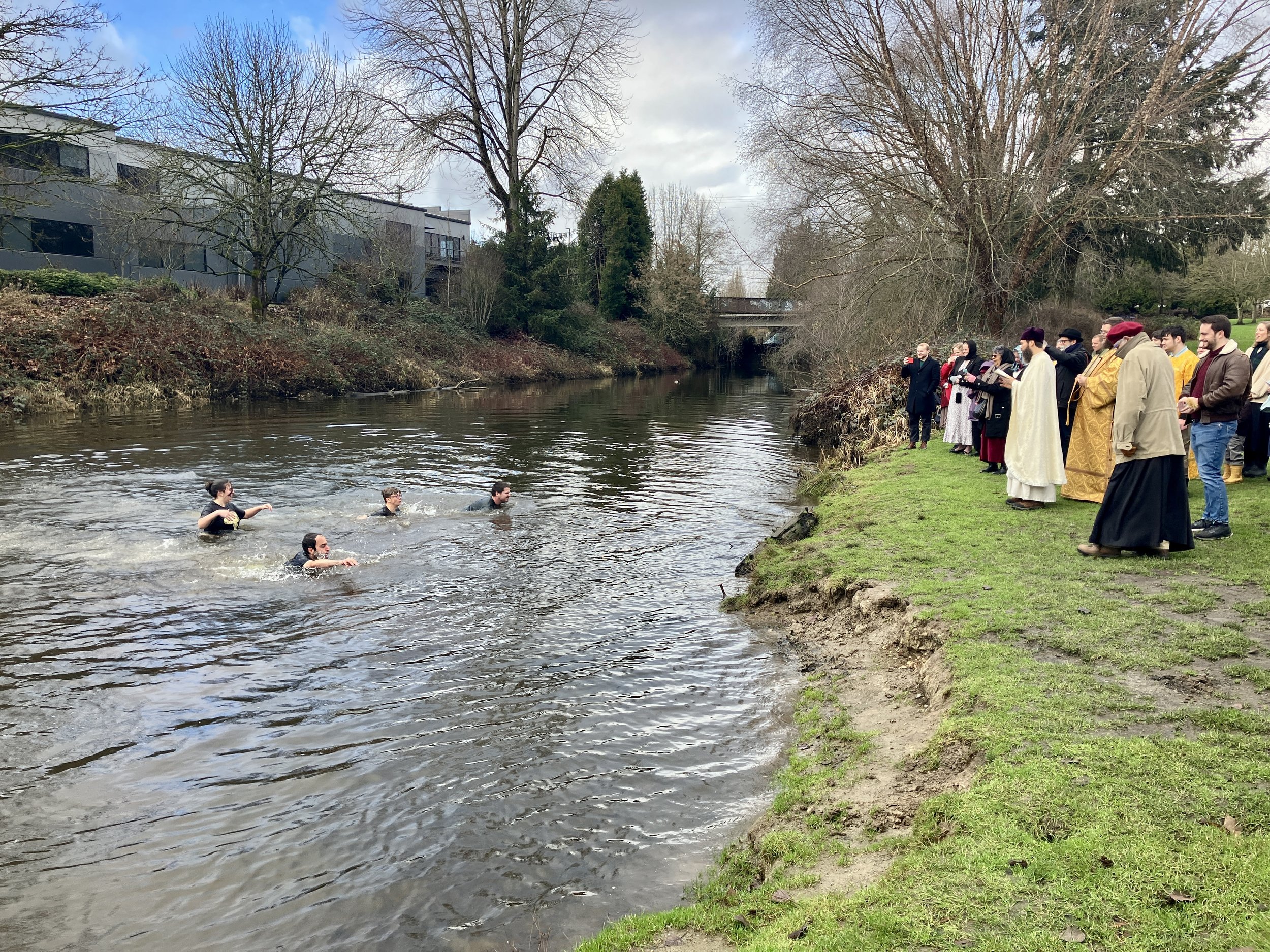 Swimmers retrieve the cross at Theophany, 2024