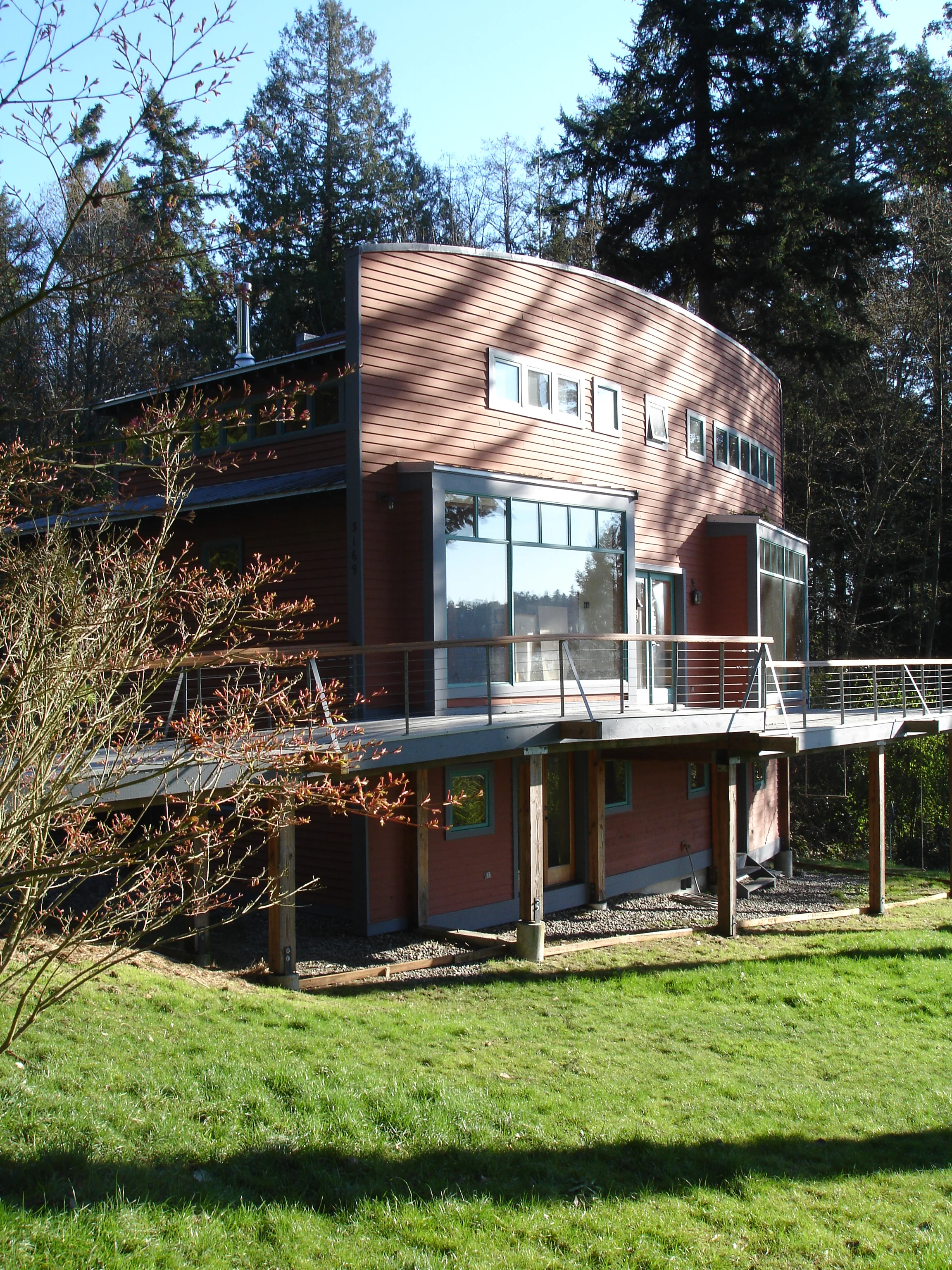 View from the curb...a gravel road services the house.
