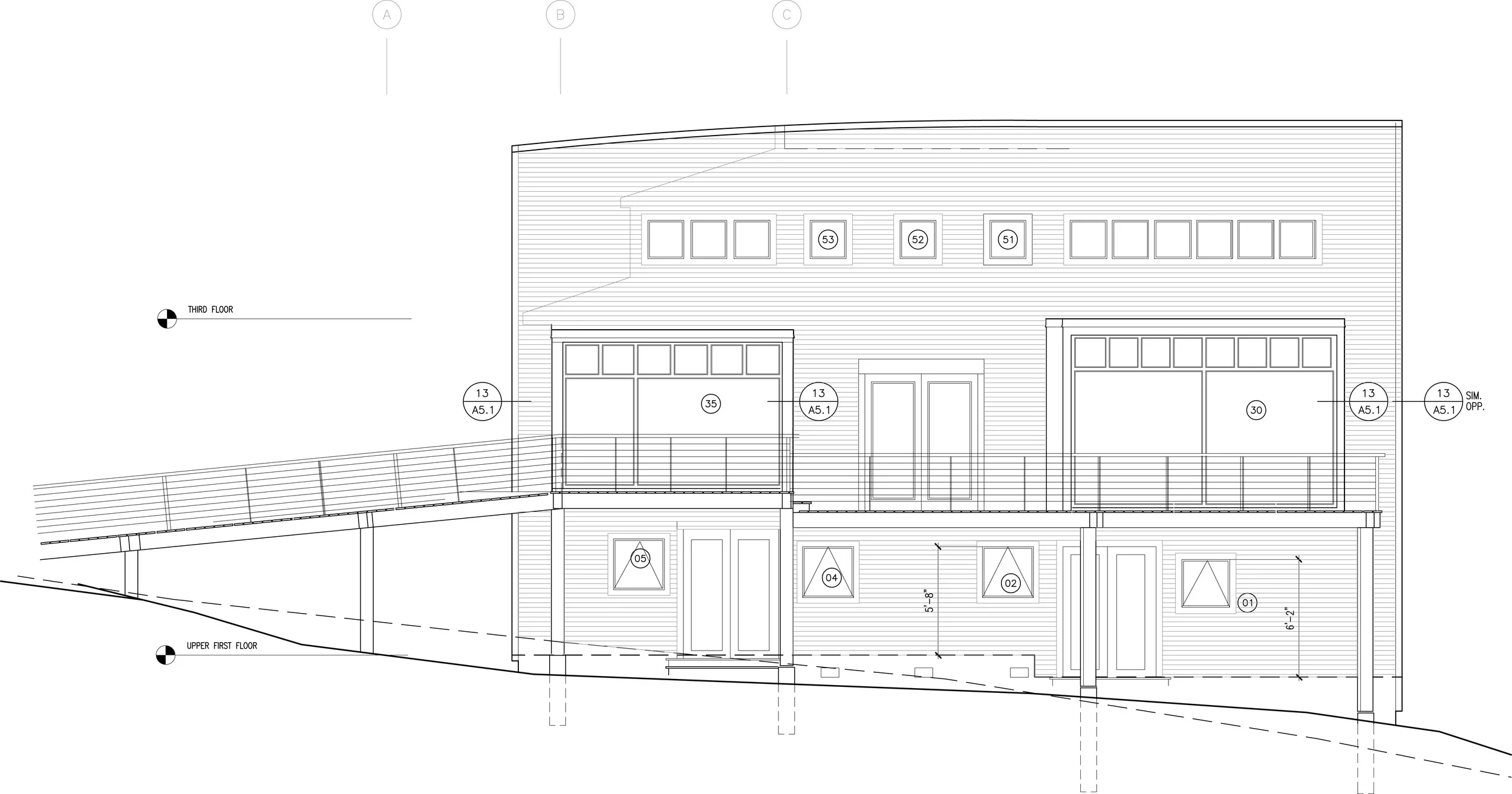 South Elevation – A curved wall that is punctured by two major living spaces.