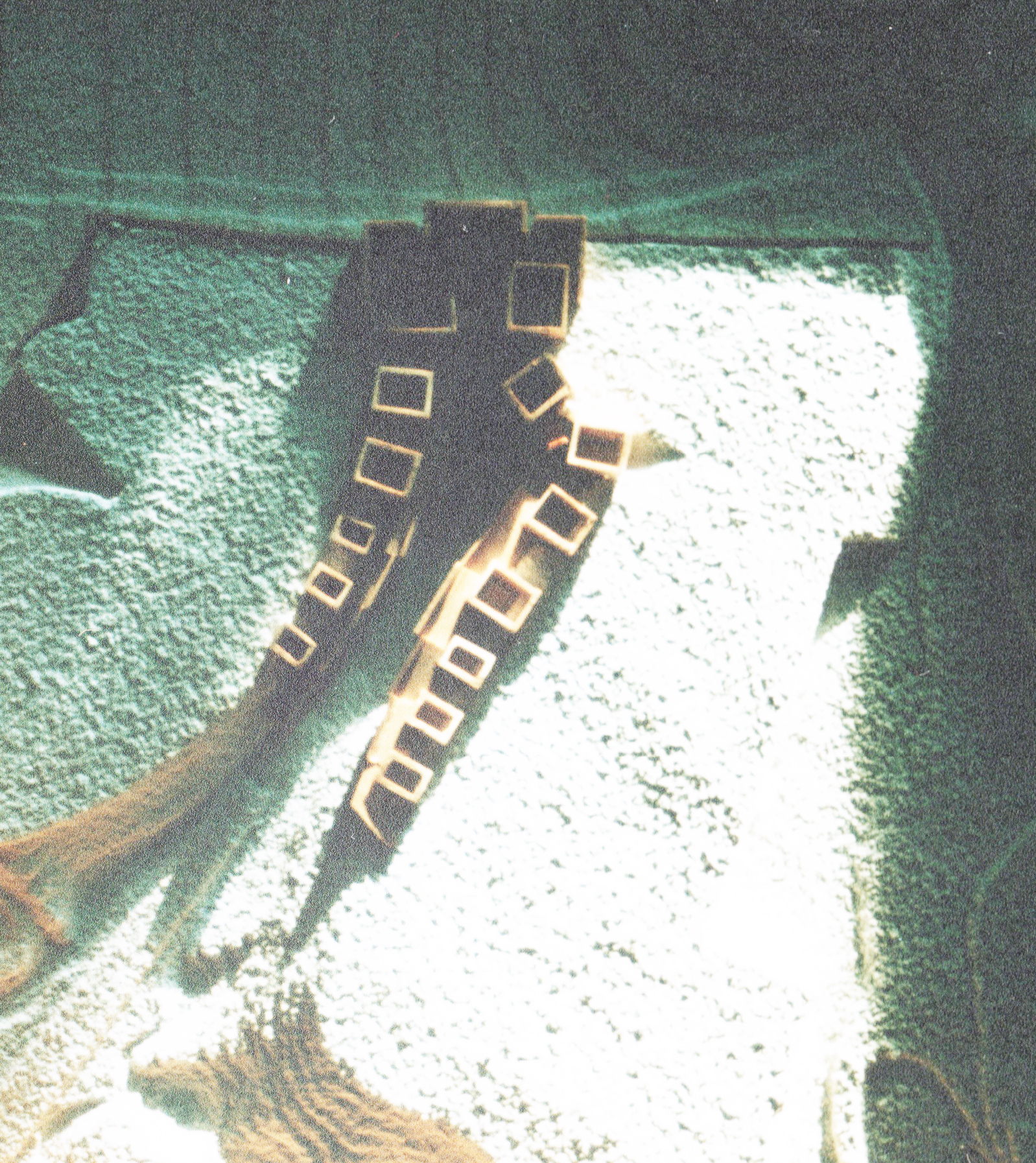 By accreting into the newly formed chasm, the necklace of Beekeeper buildings provide slope stabilization, retention.