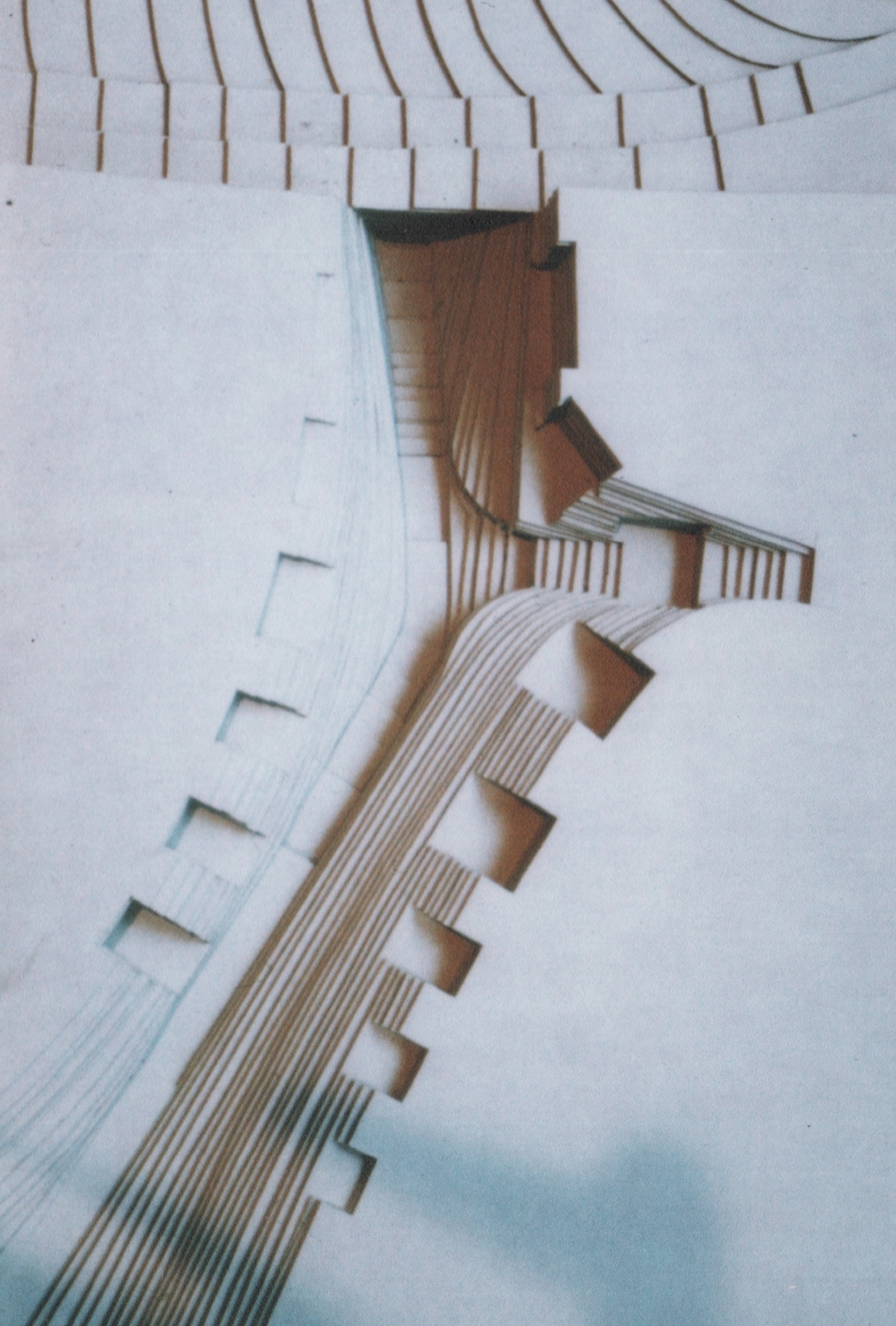 Refinement of the contour planning yields new space, climbs out of the dark rail tunnel and onto the sky fall plateau.