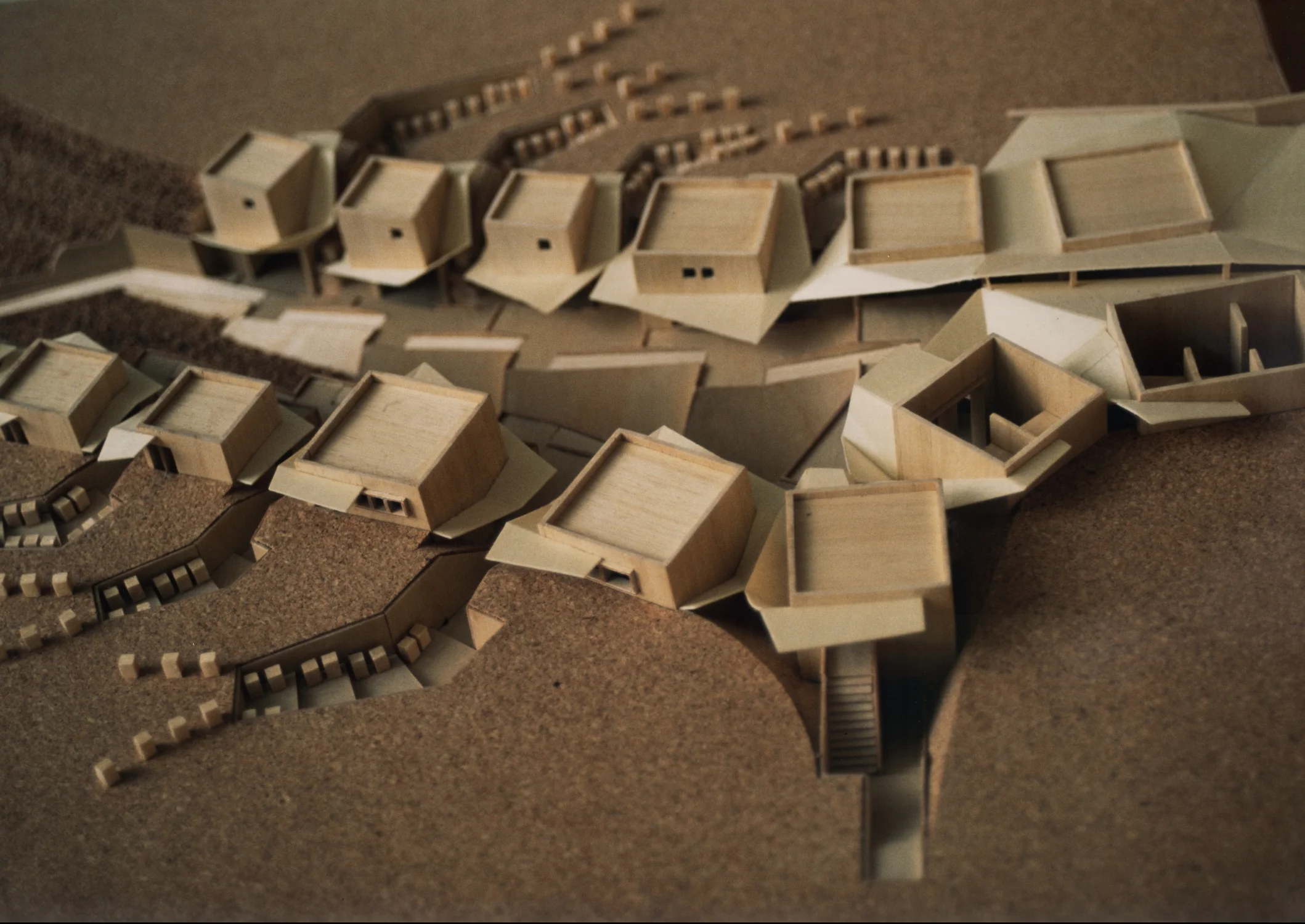 1:200 Site Model: access to the uphill plateau from the Retail Bee Products shop is possible via the West Stair which also accesses the locker rooms and rail station tunnel below.