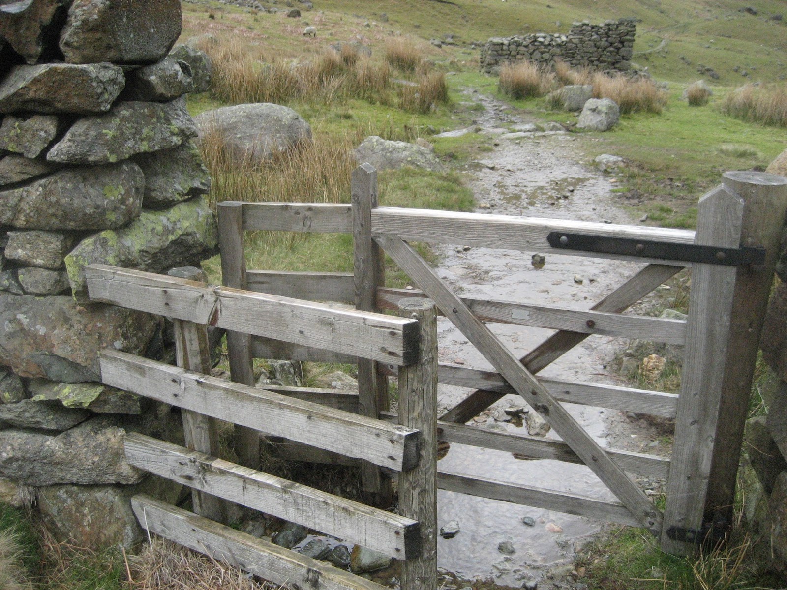 A cow cannot pass through this stile, and that is a comfort to the land owner- and a courtesy for the foot traveller.