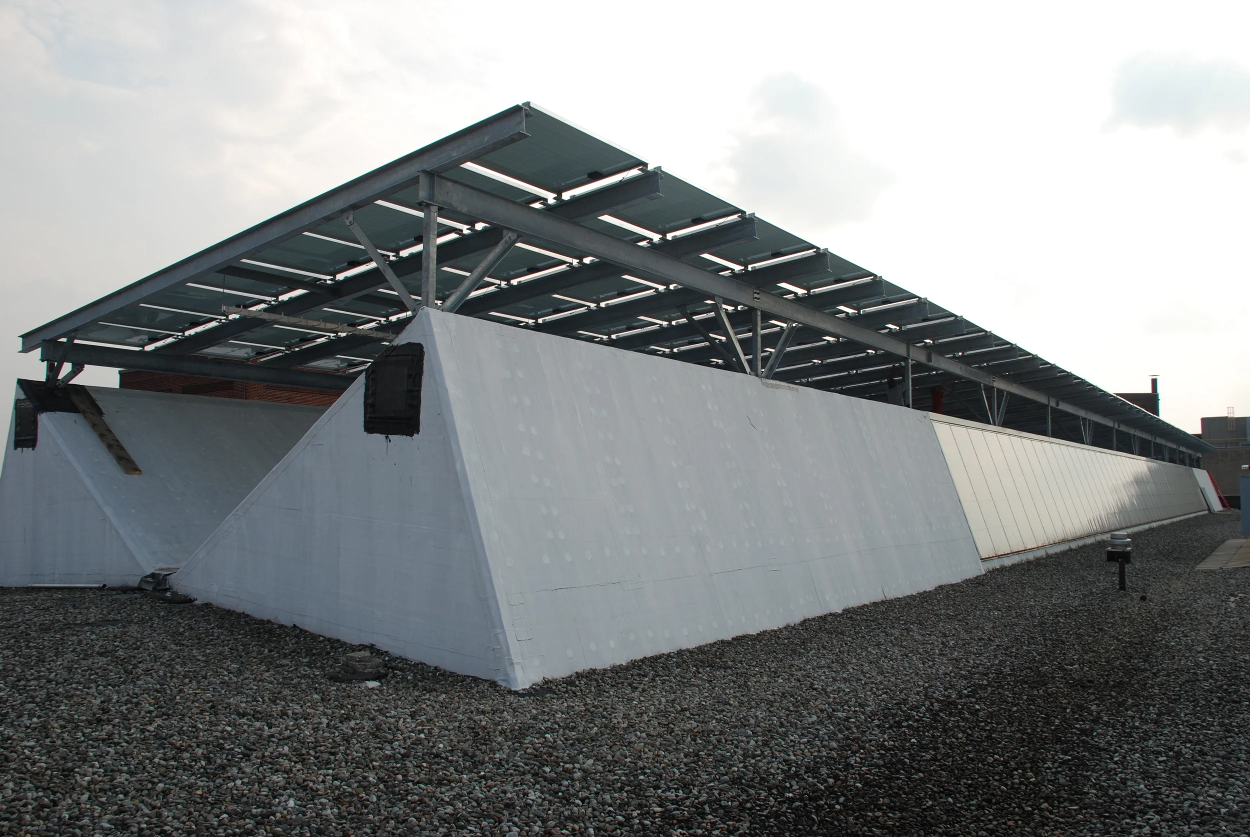 Photo 4: Exterior view of roof structure with Completed 103 kW Solar Installed in 2009