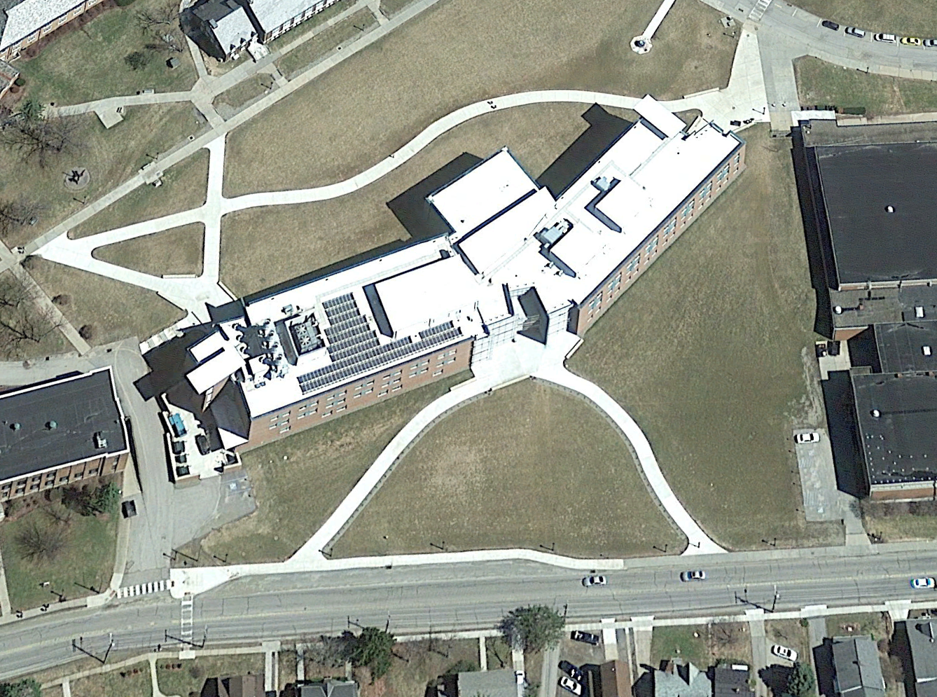Figure 1: Aerial Photo showing completed building with 28kW self-ballasted solar array mounted on west roof.