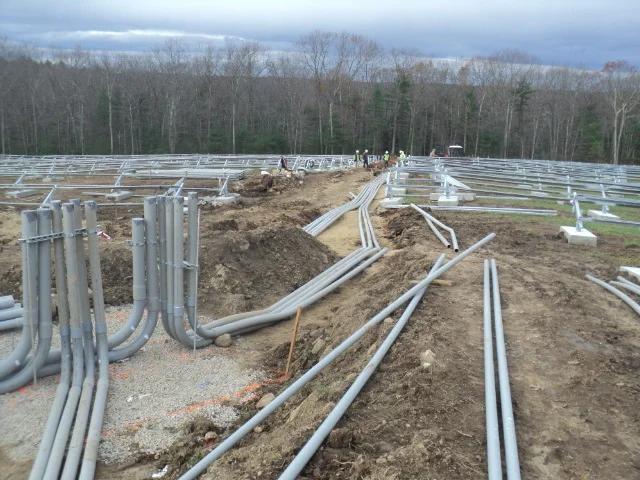Inverter pad #6 conduits from Combiner boxes.JPG