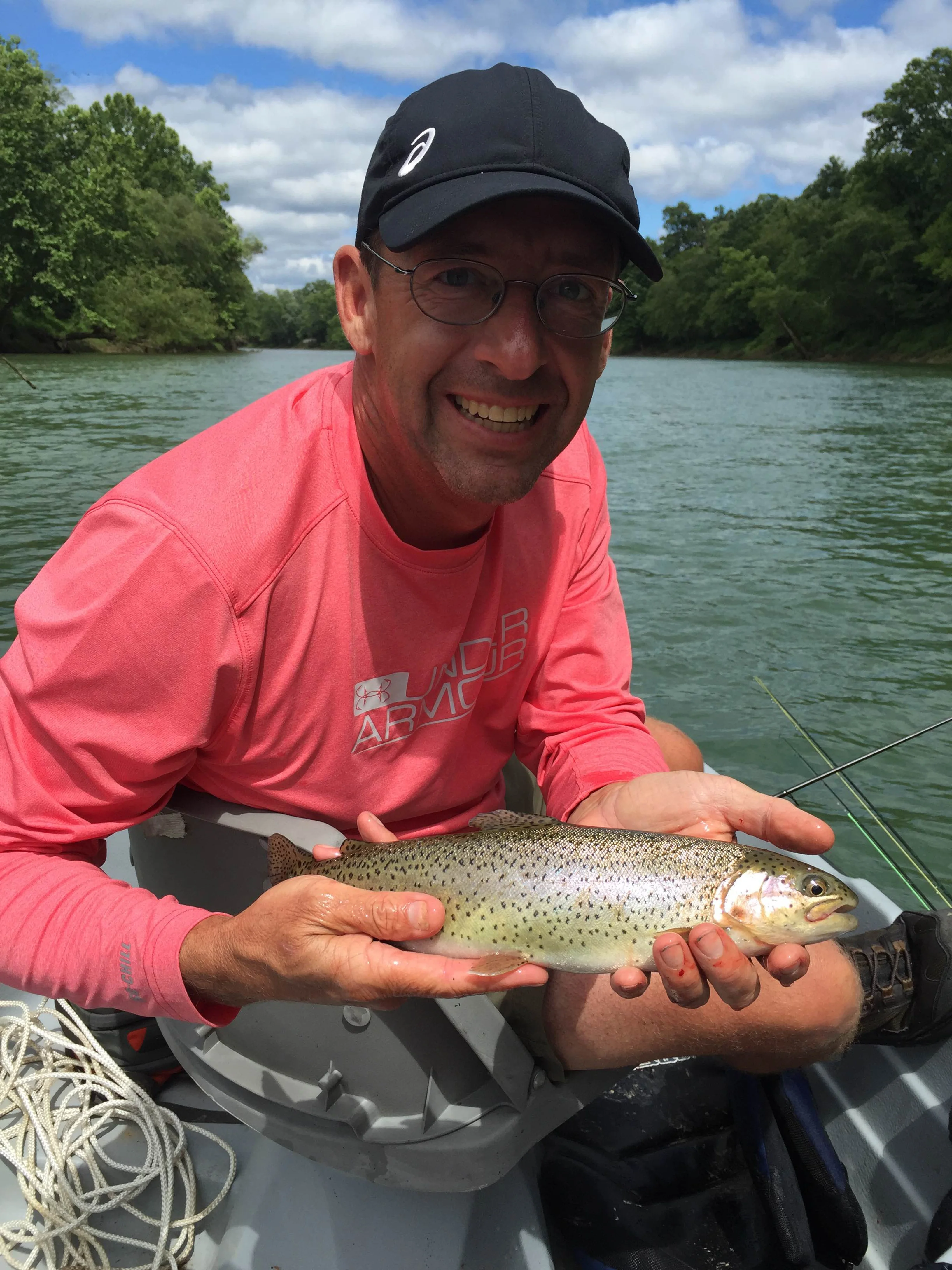 Uncle Paul with his first rainbow trout on the fly. 