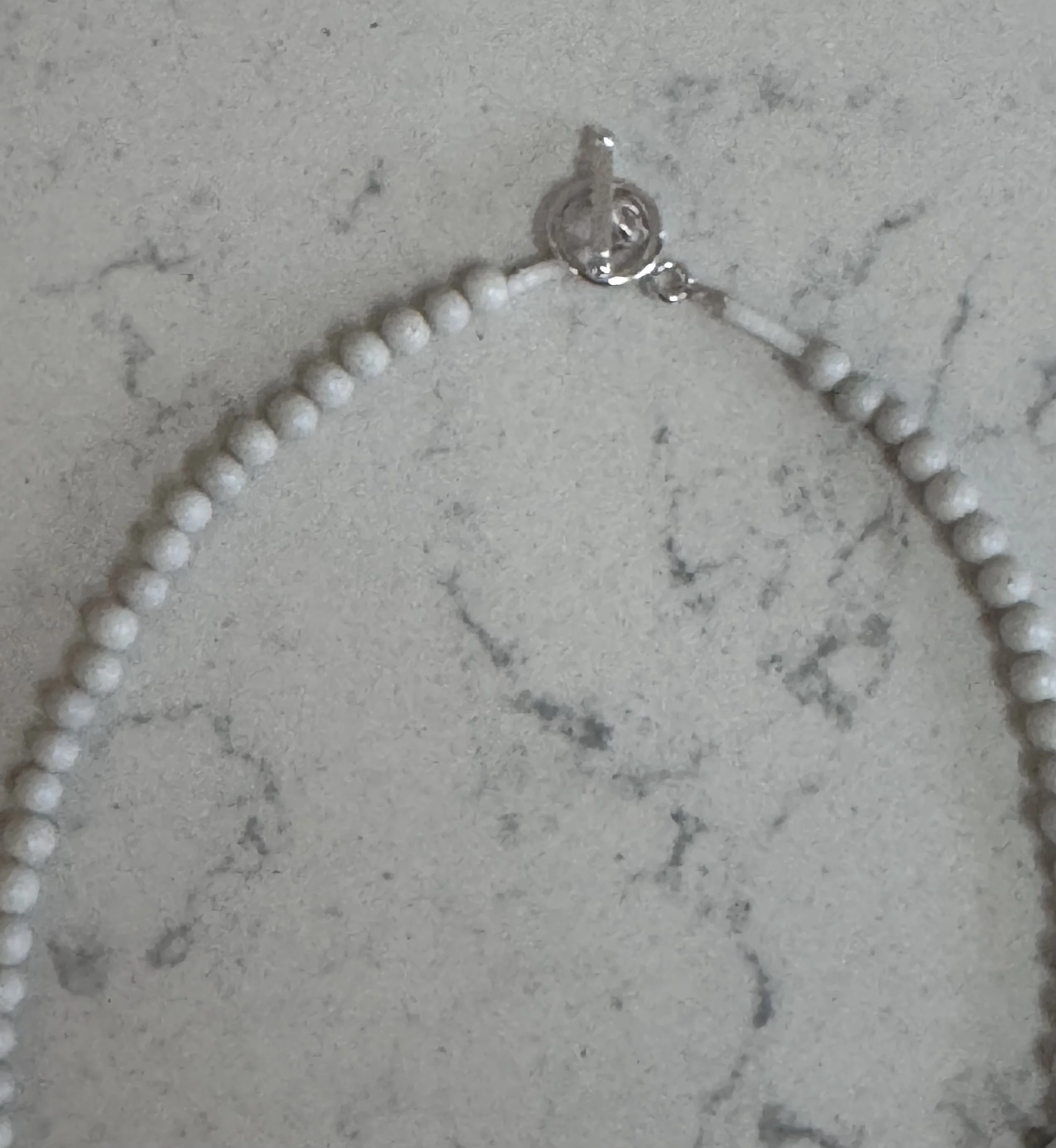 White on White clasp.jpeg
