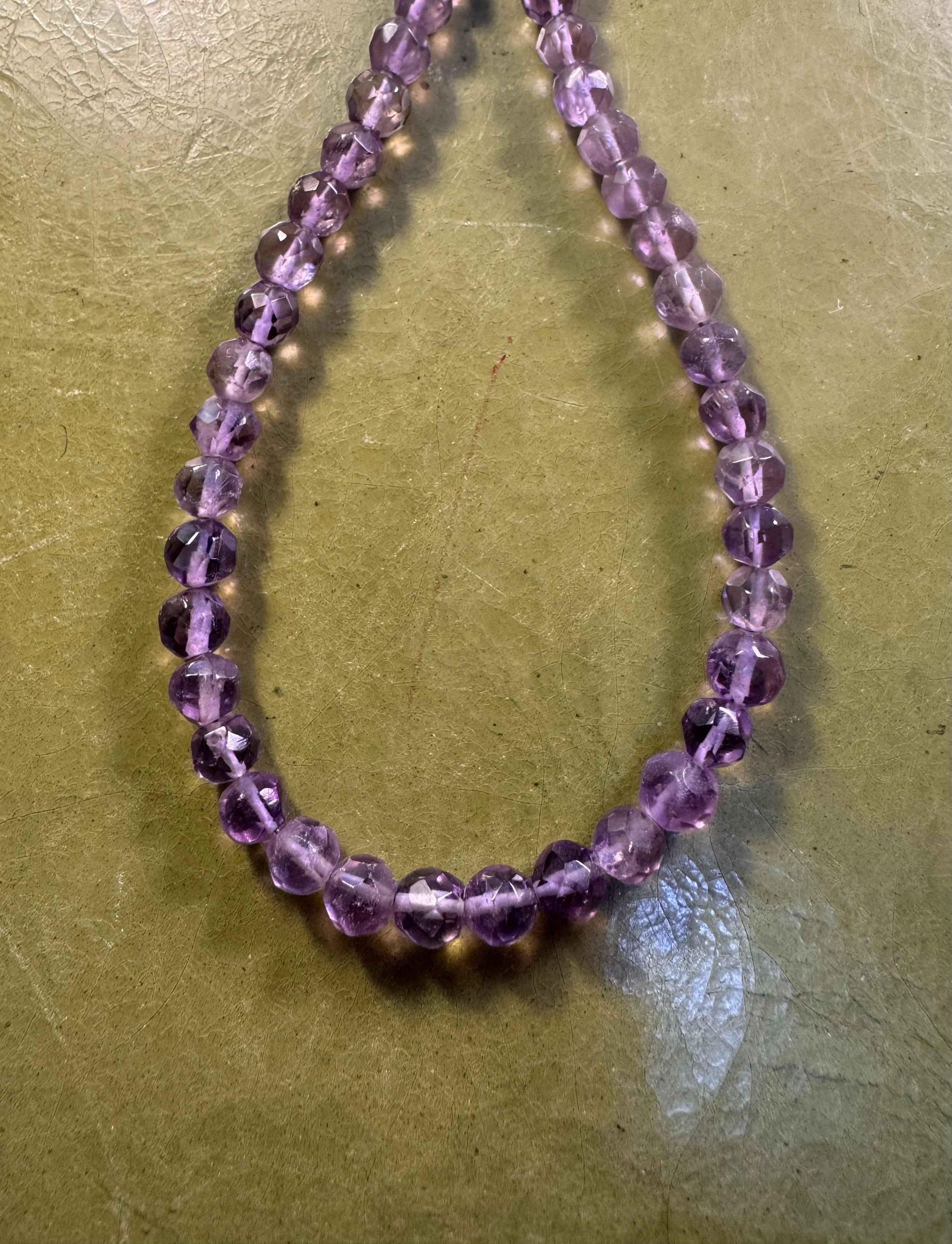 Round Faceted Amethyst closeup.jpeg