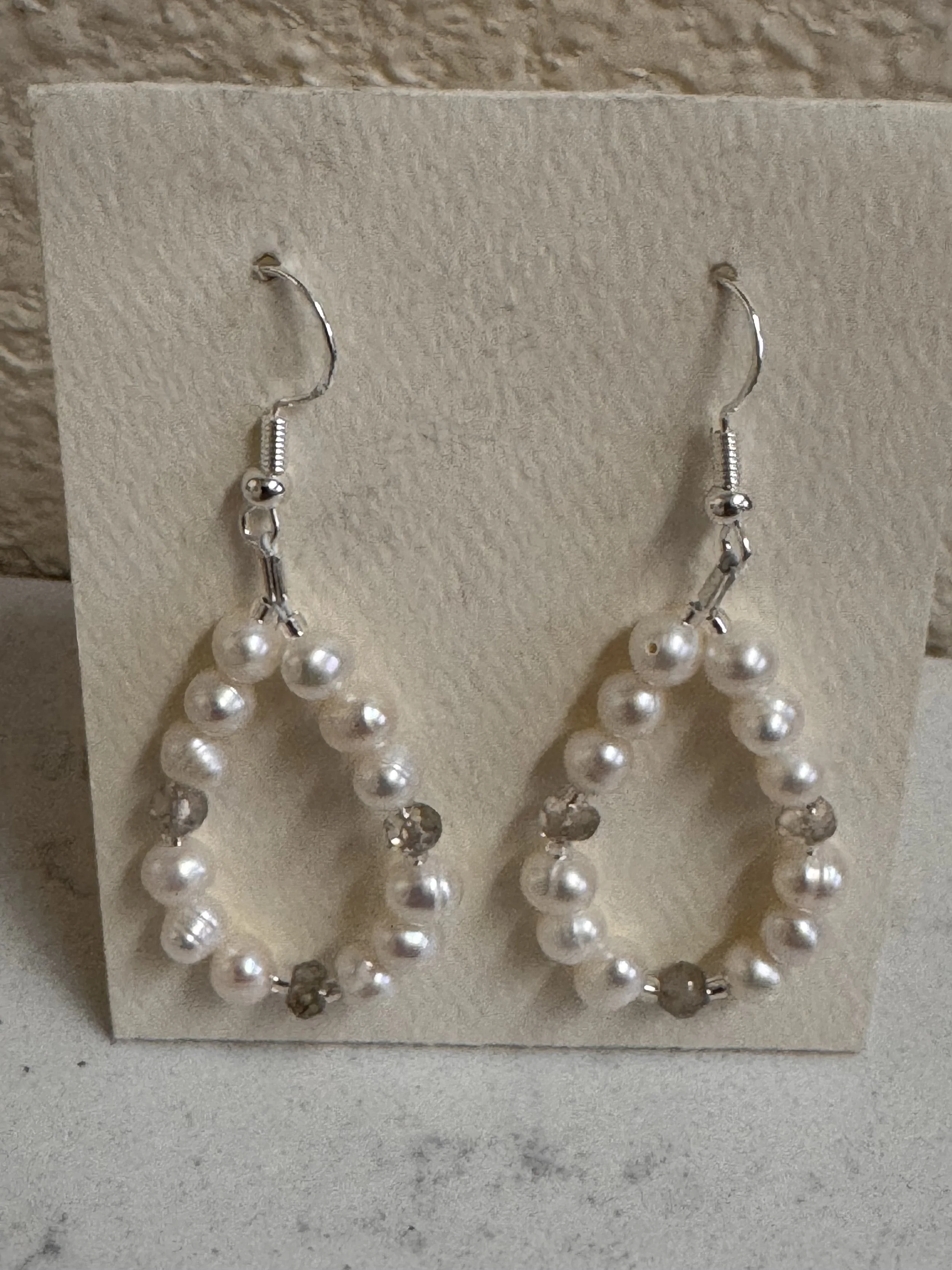 Cultured Pearls and Smoky Qyartz on stand.jpeg