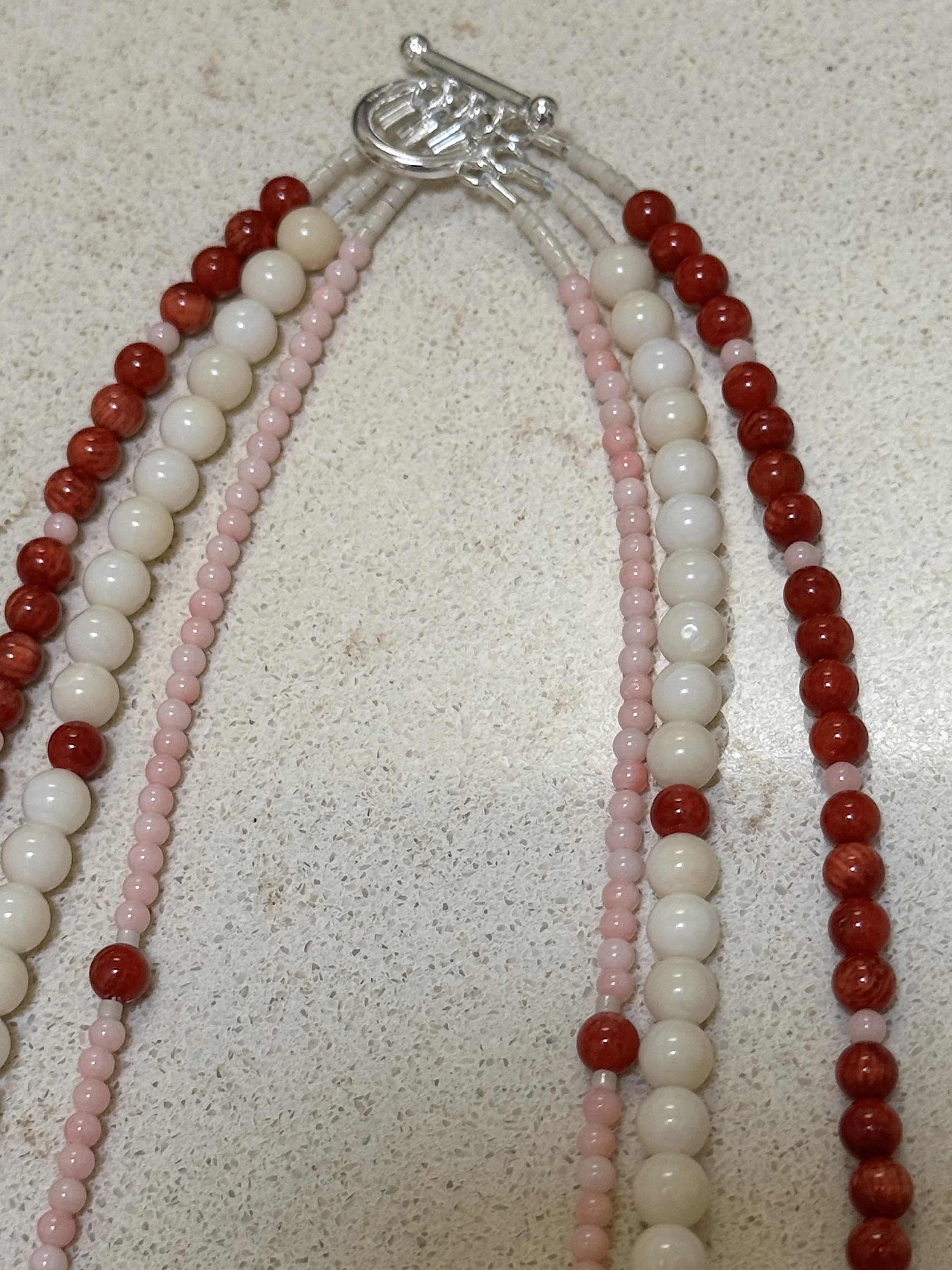 Coral Triplet clasp.jpg