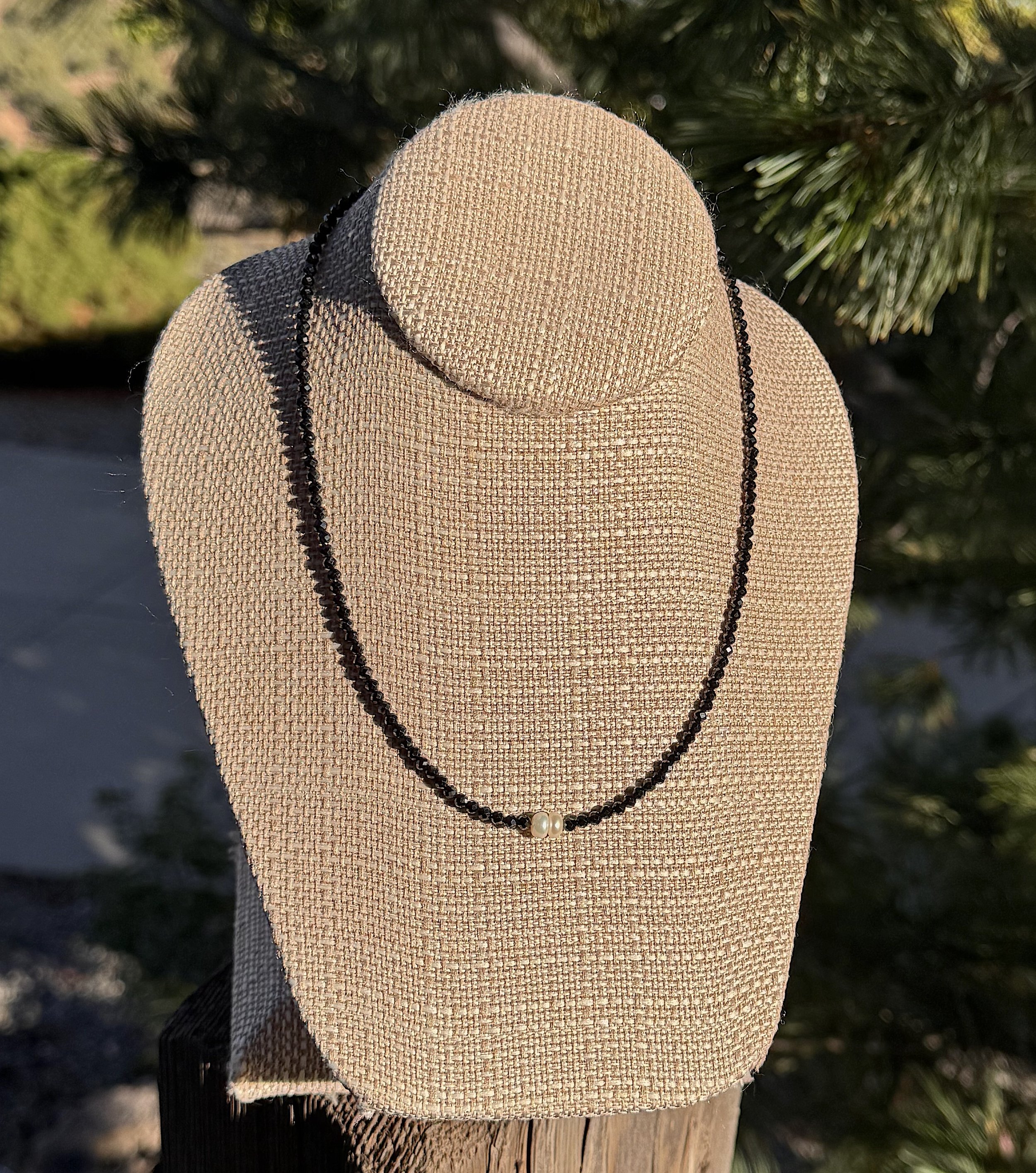 Two Pearls-Faceted Blck Spinel fence.jpeg