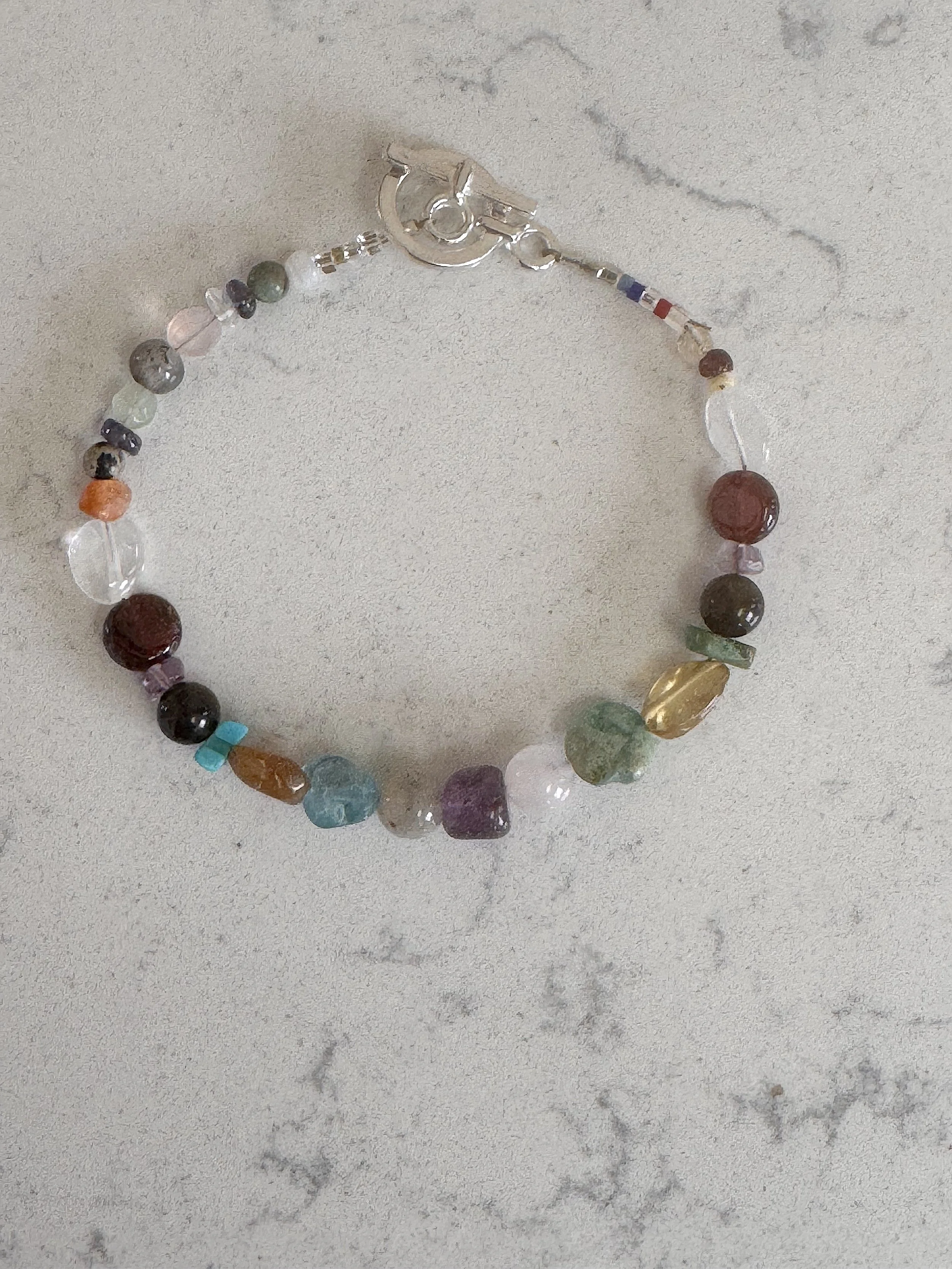 Everything Odds and Ends braceleet, Amethyst center.jpeg