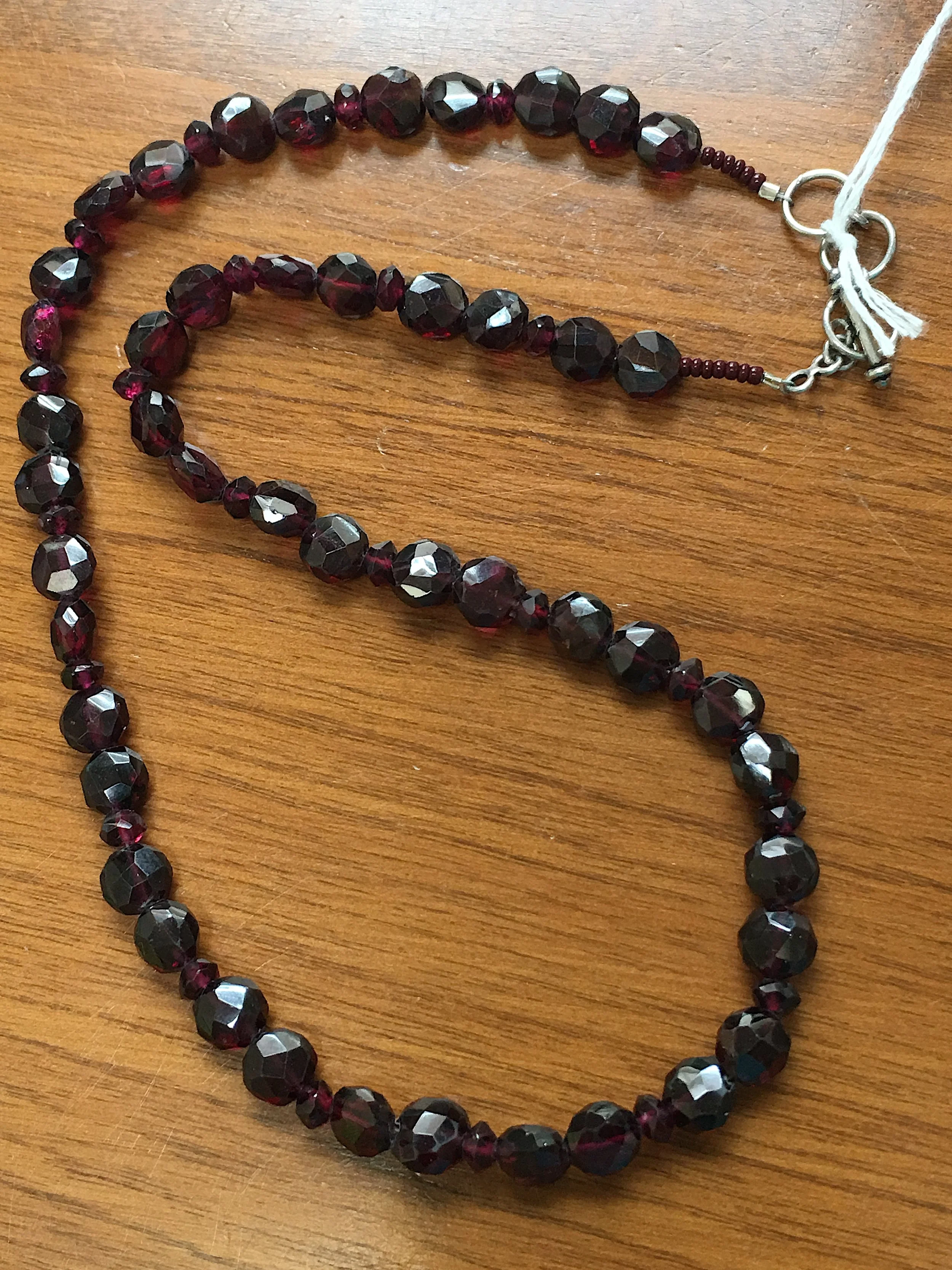 Garnet faceted coins 1.JPG