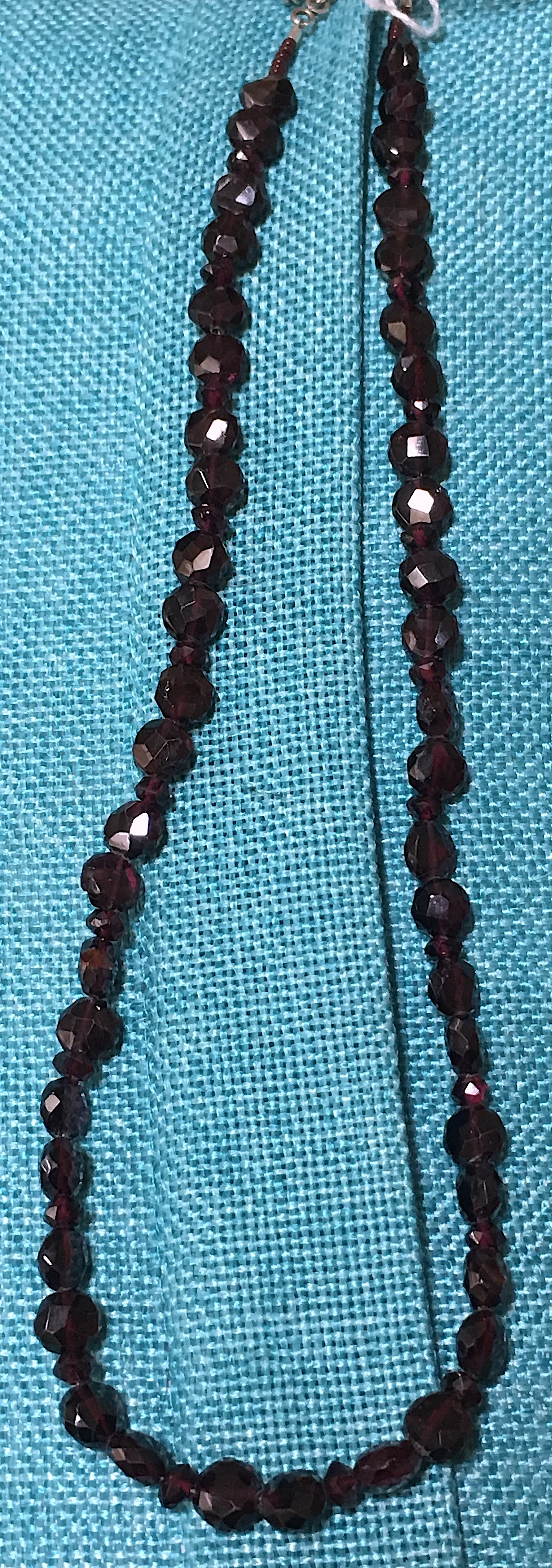 Faceted Garnet coins.JPG