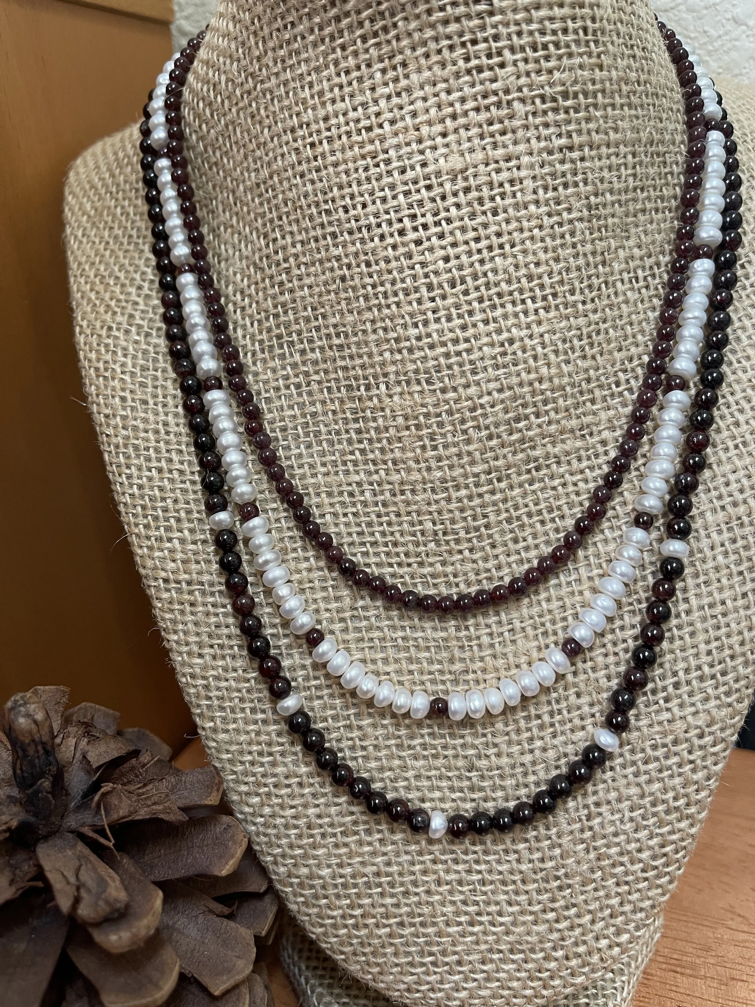 January June on stand with pinecone.jpg