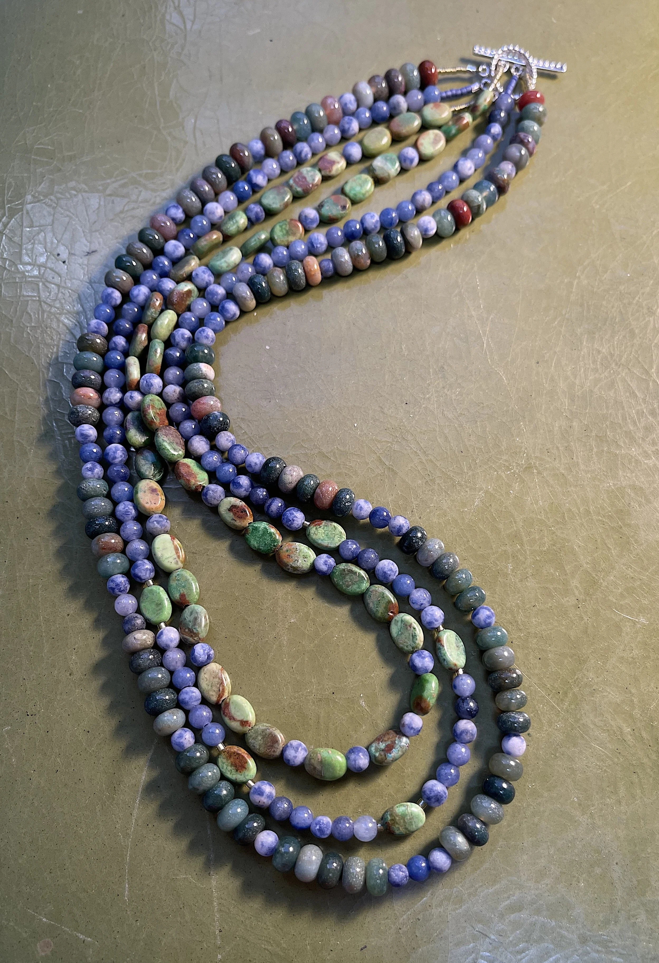 Juniper berries curved on green-good.jpg