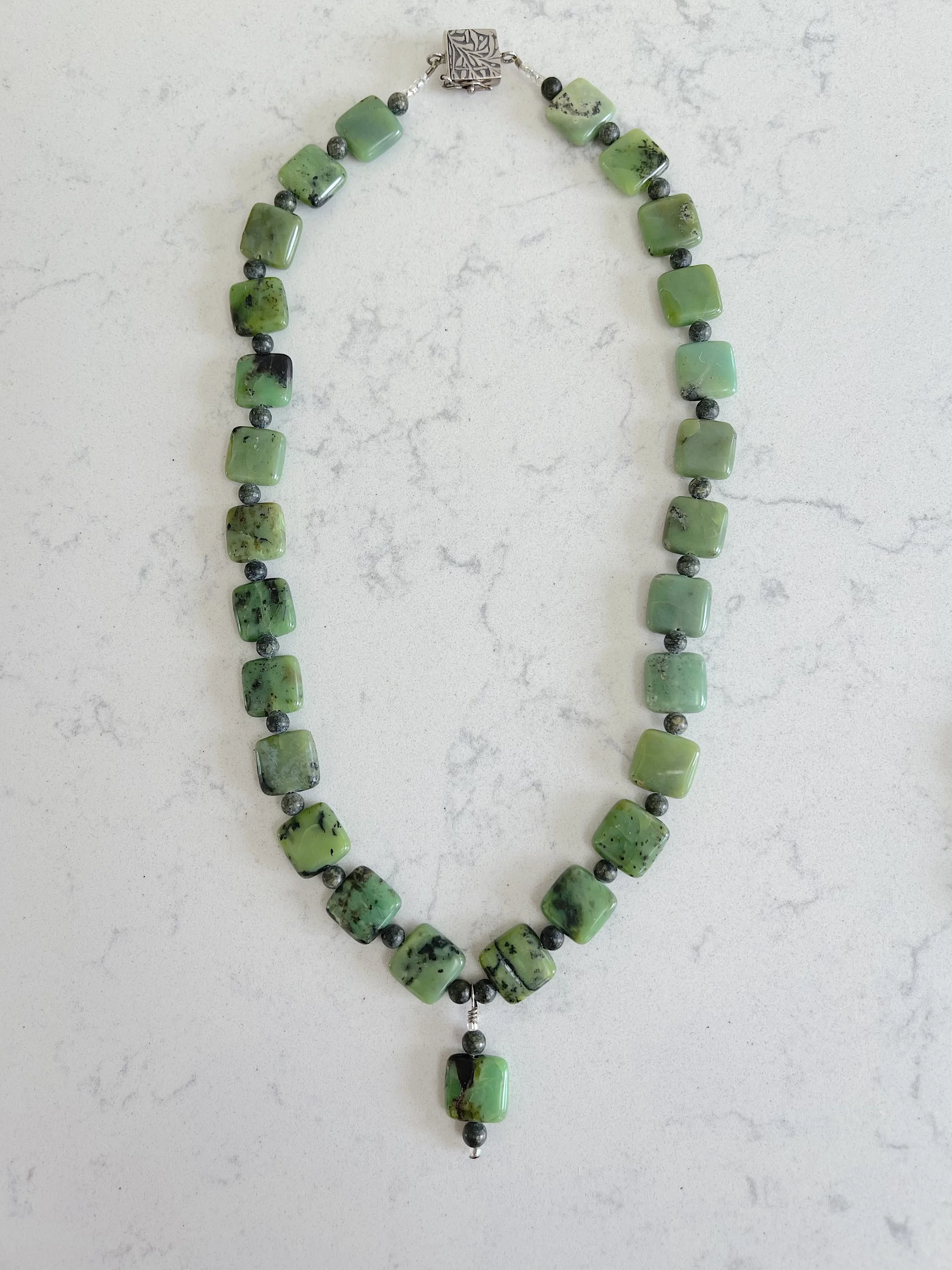 Eat Your Greens necklace on quartz.jpg