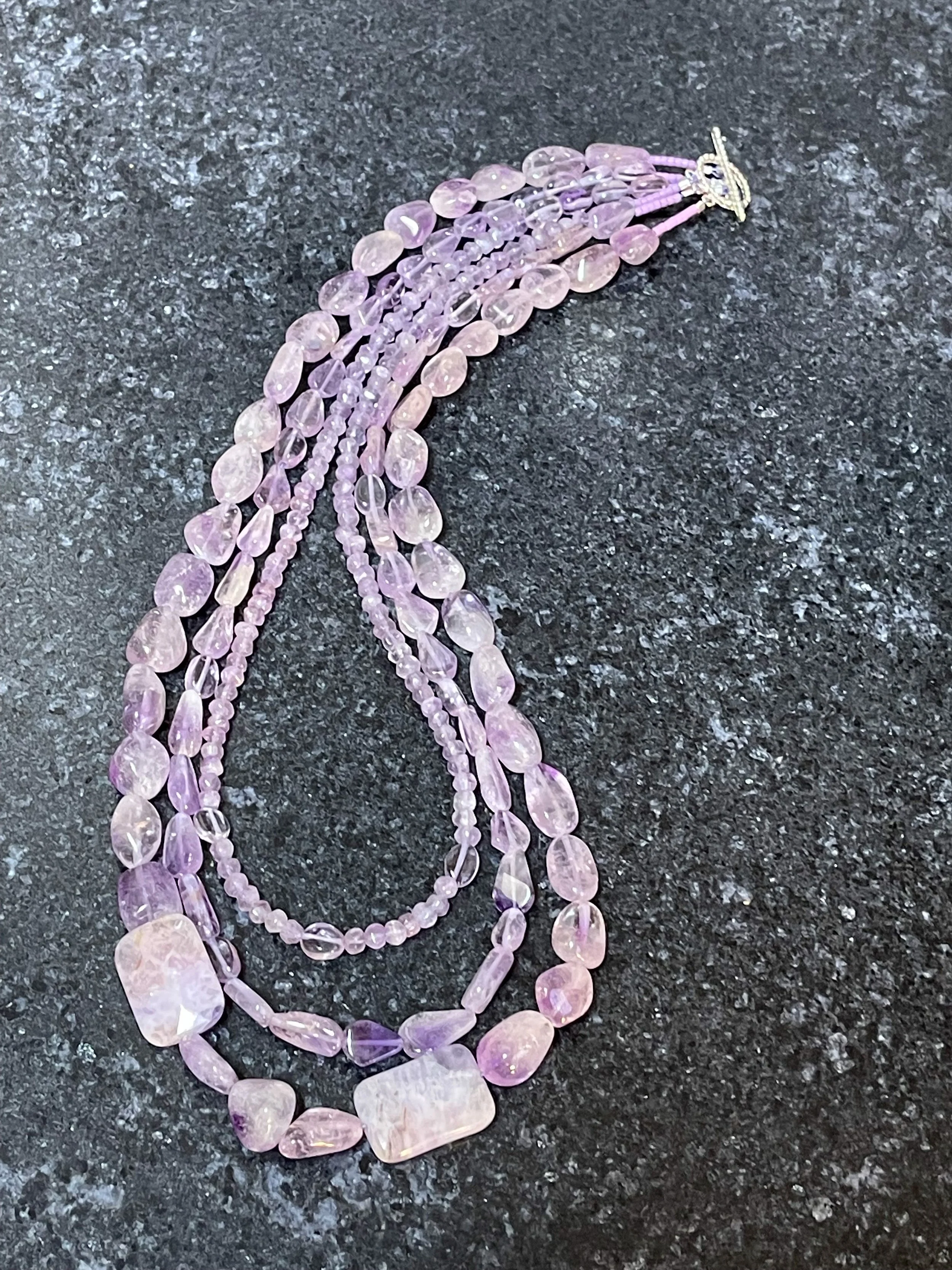 Lavender Blossoms on black curved.jpg