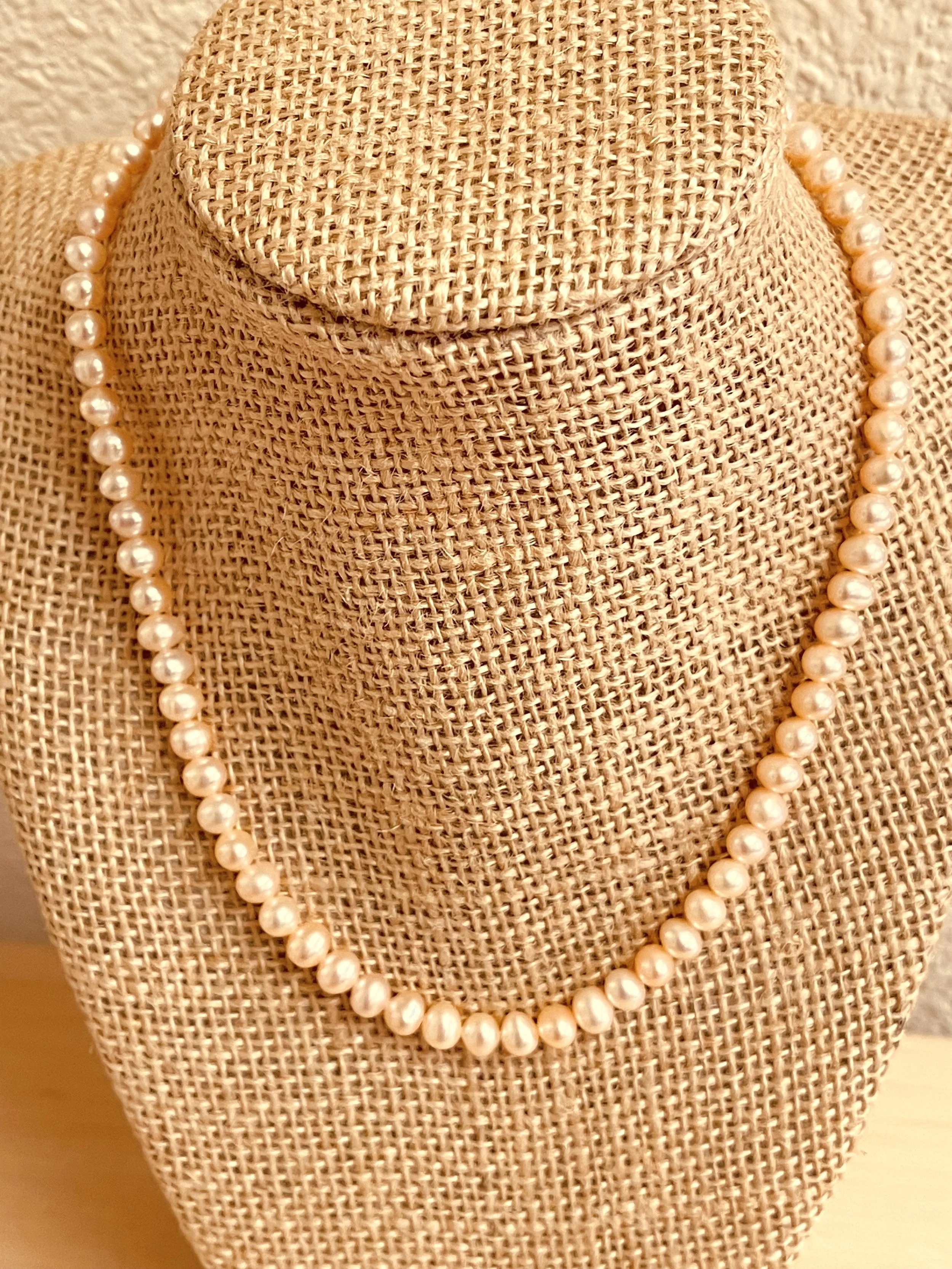 Peach pearls on stand.jpg