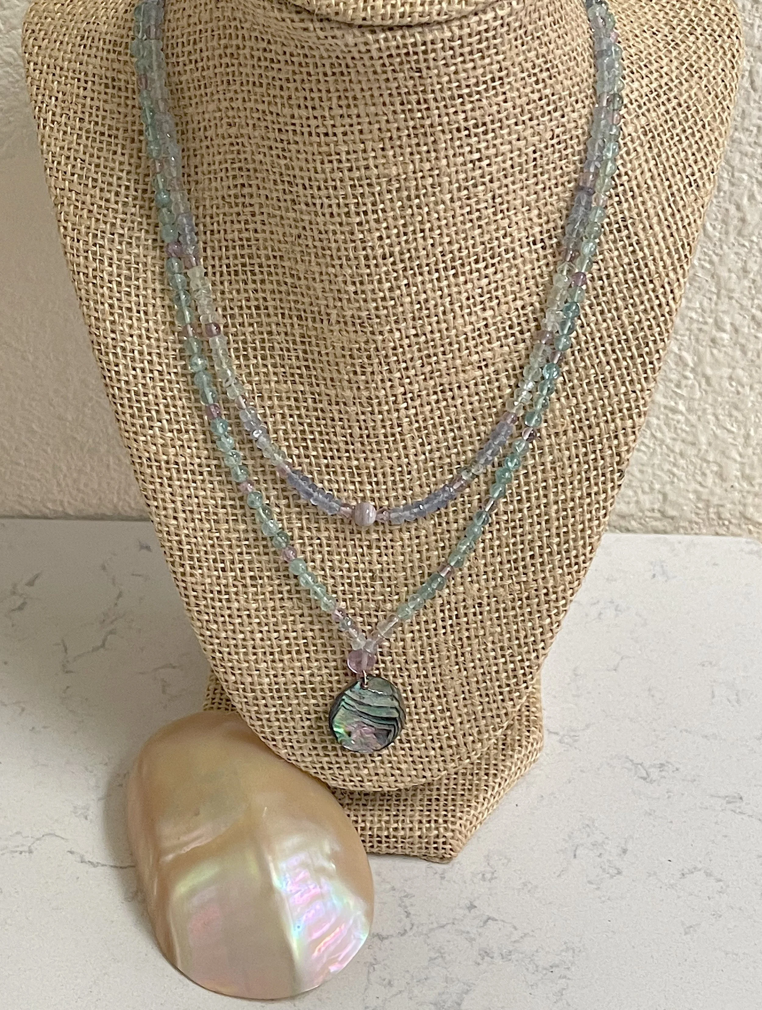 South Pacific on stand with shell in front.jpg