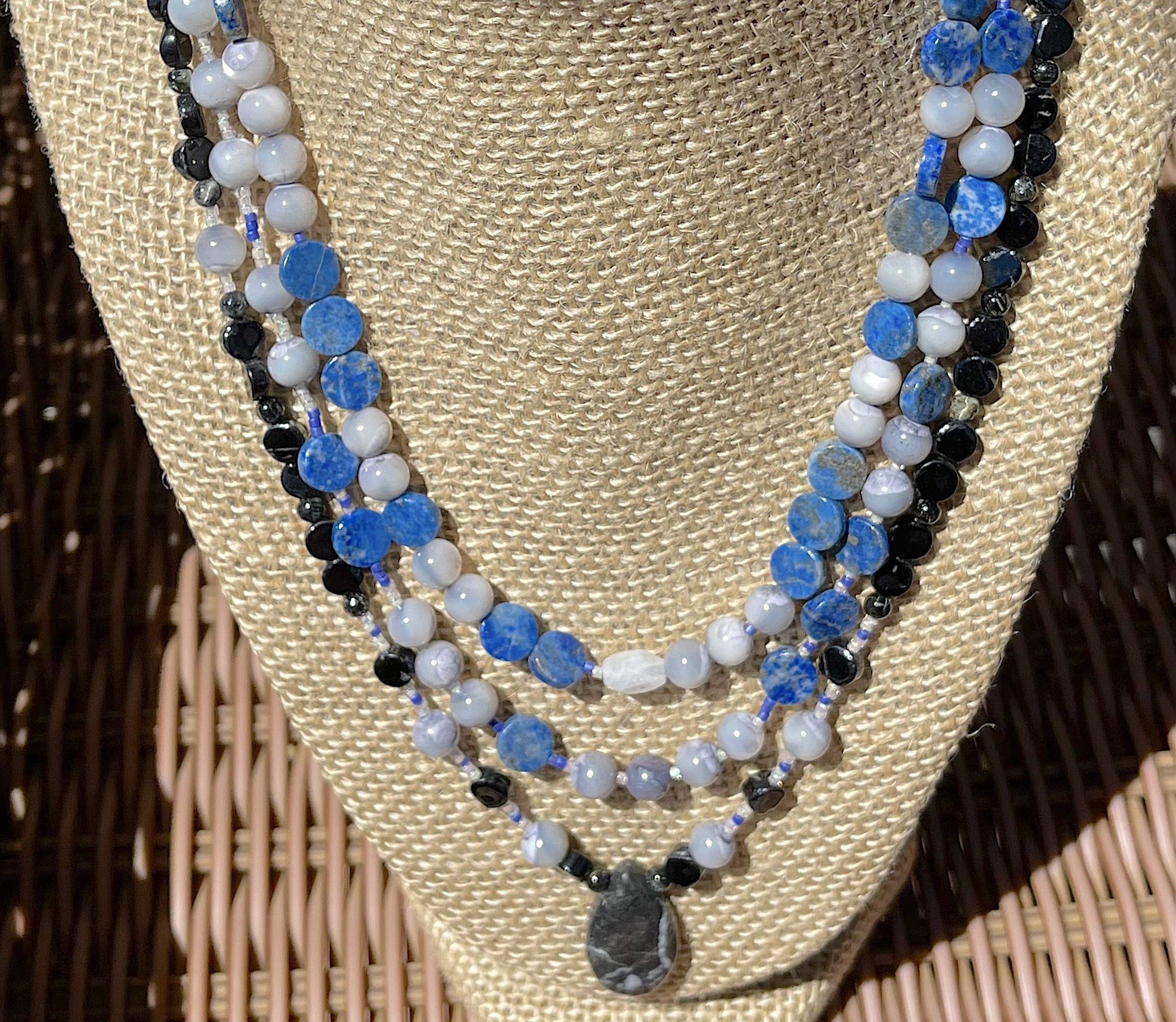 Woman in black on wicked table cropped.jpg