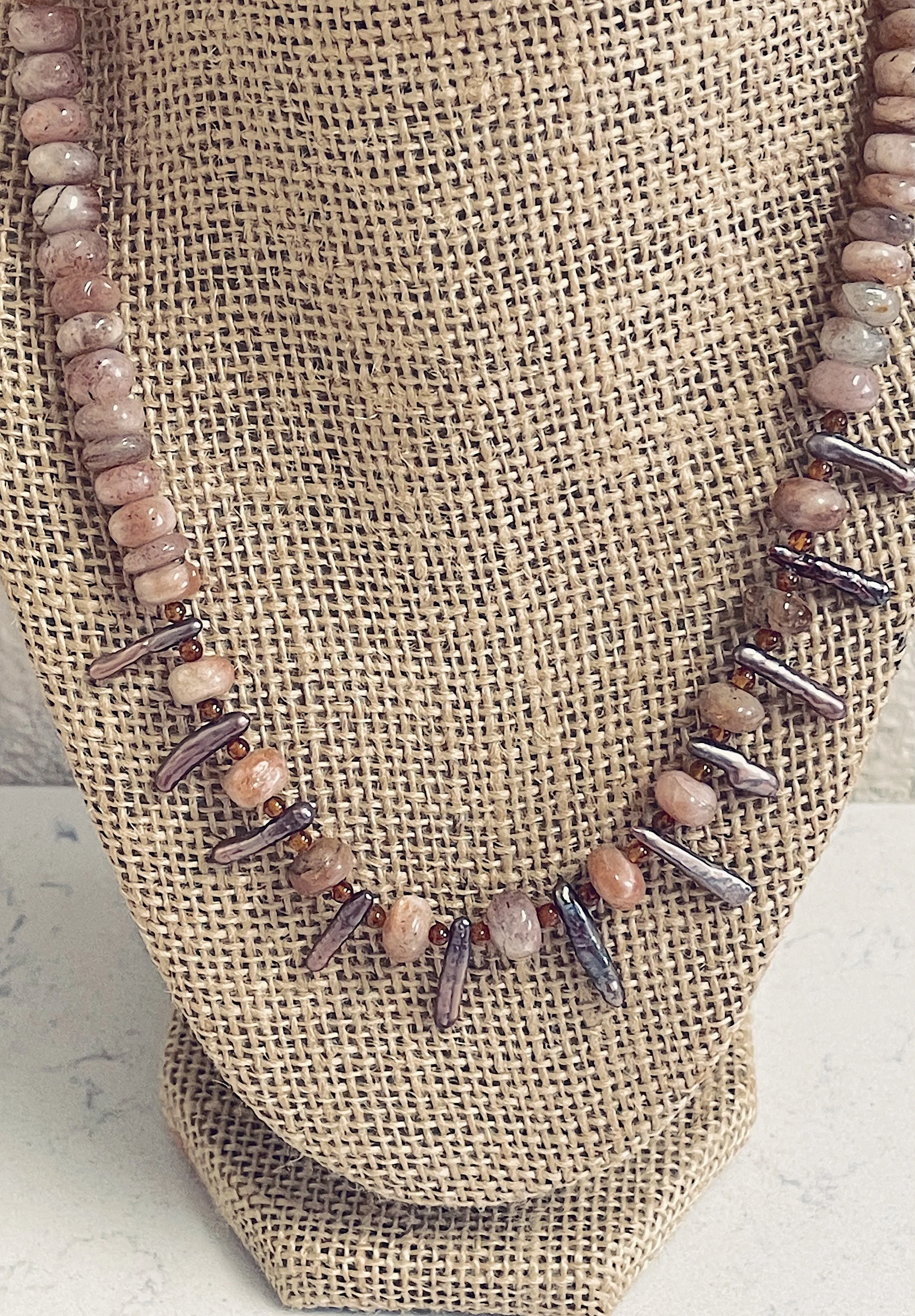 SUnstroked Pearls on stand:ok.jpg