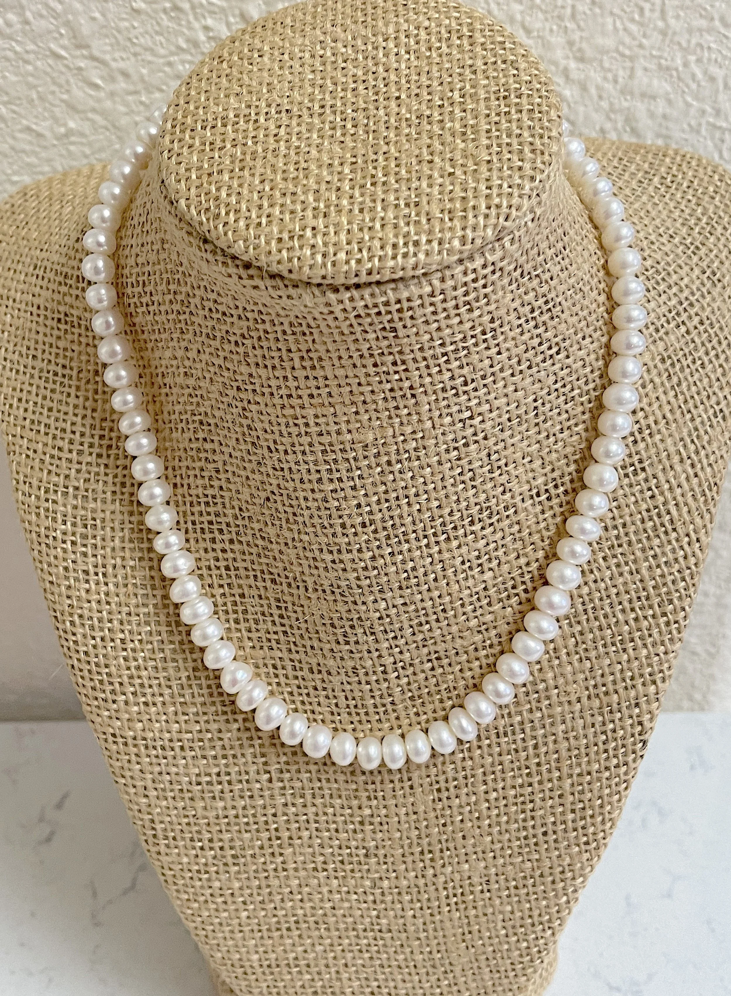 White Button pearls on stand-good.jpg
