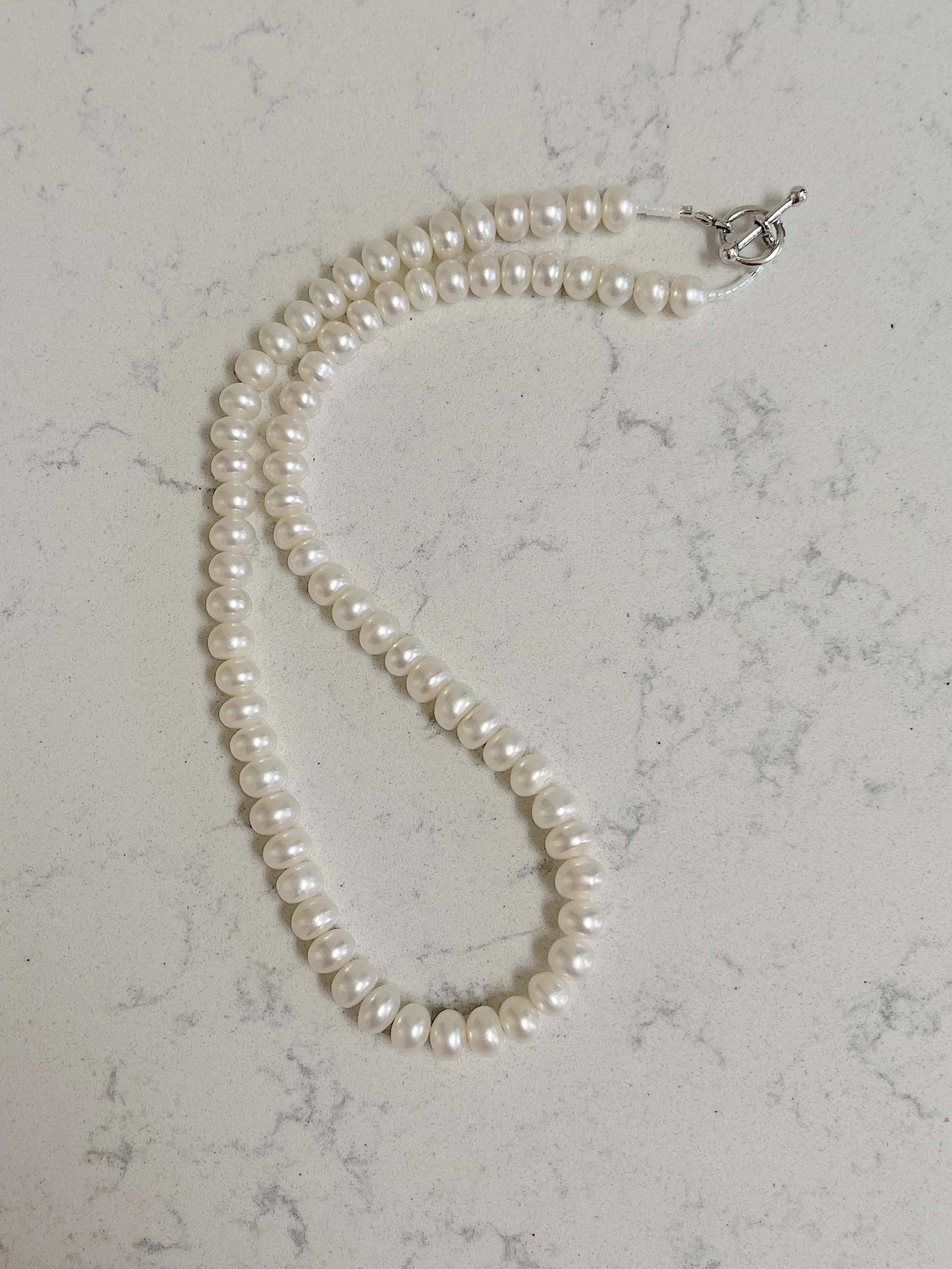White Button pearls curved.jpg