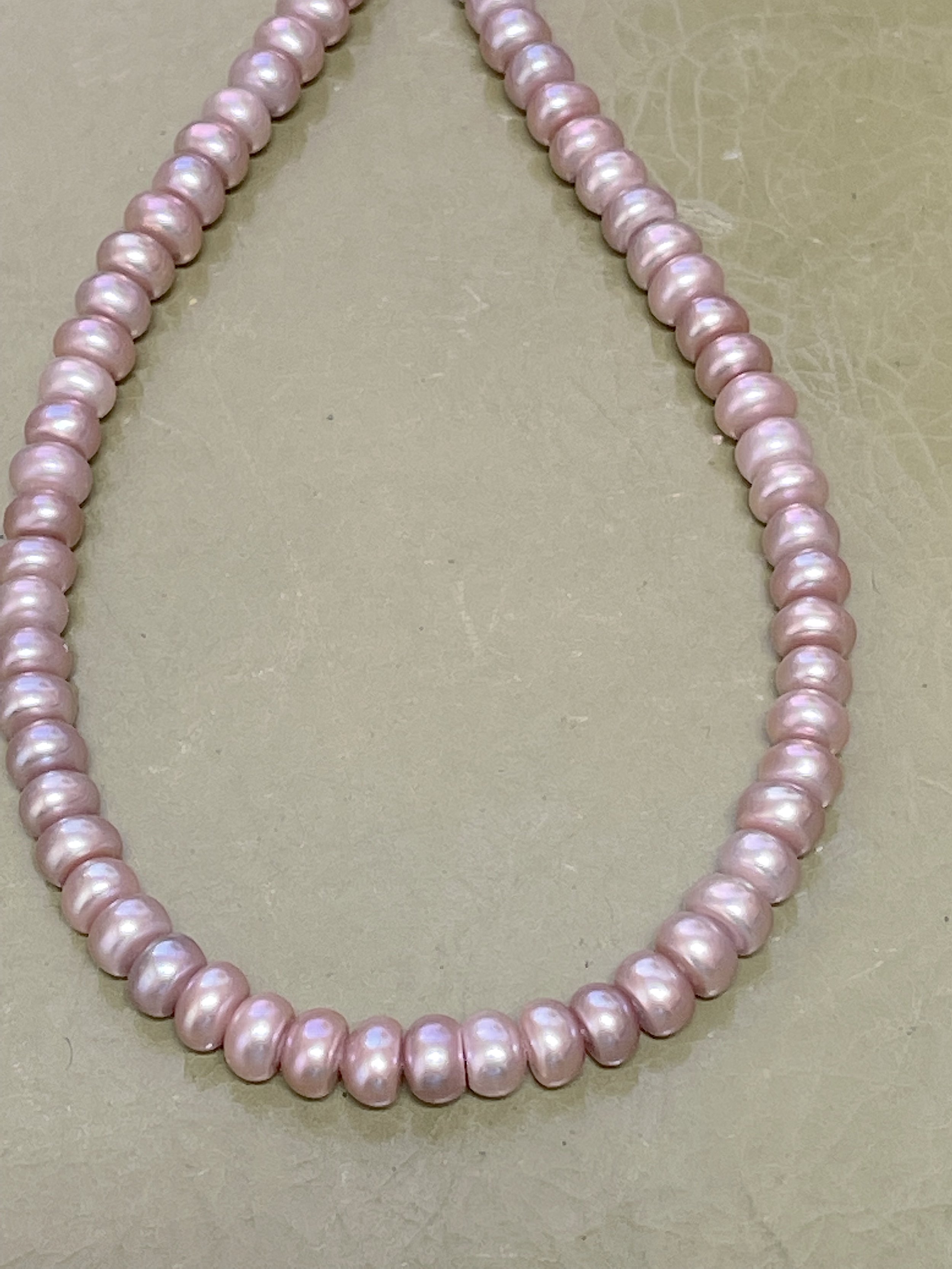 Mauve button pearls closeup.jpg