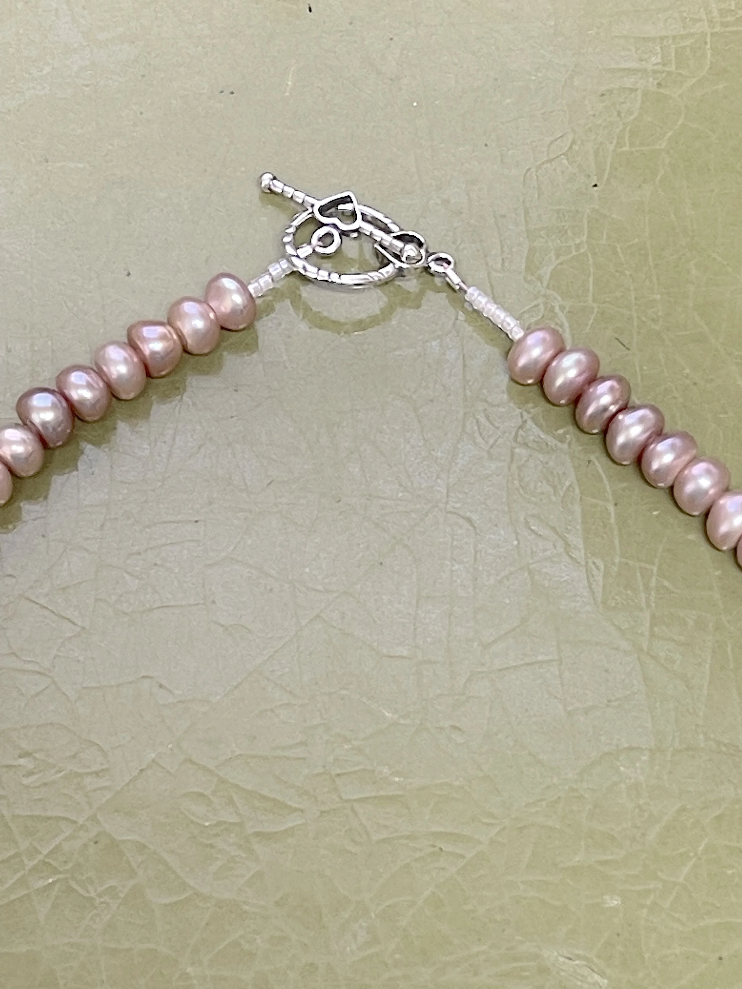 Mauve BUtton pearl clasp.jpg