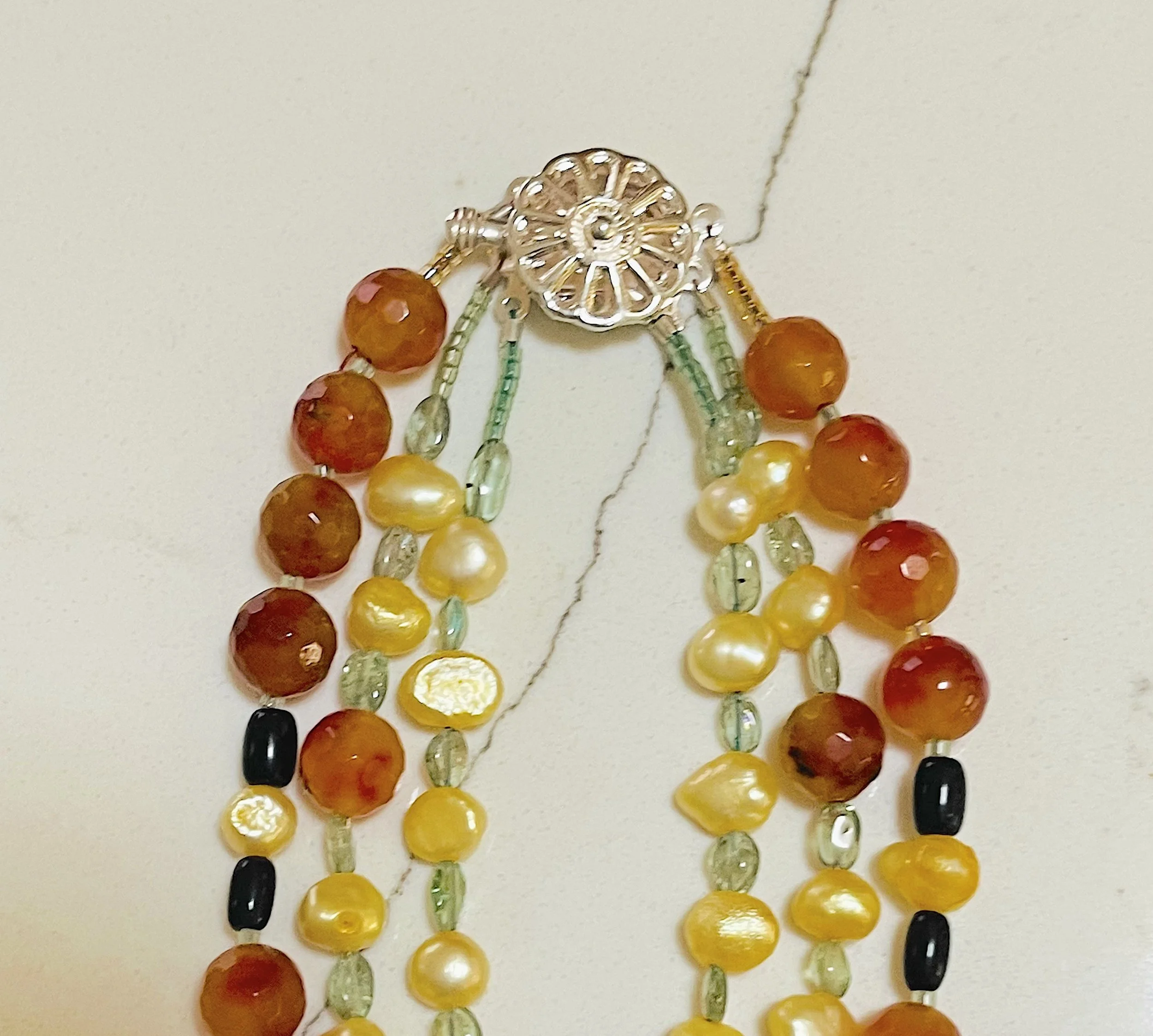 Bumble:marigold clasp.jpg