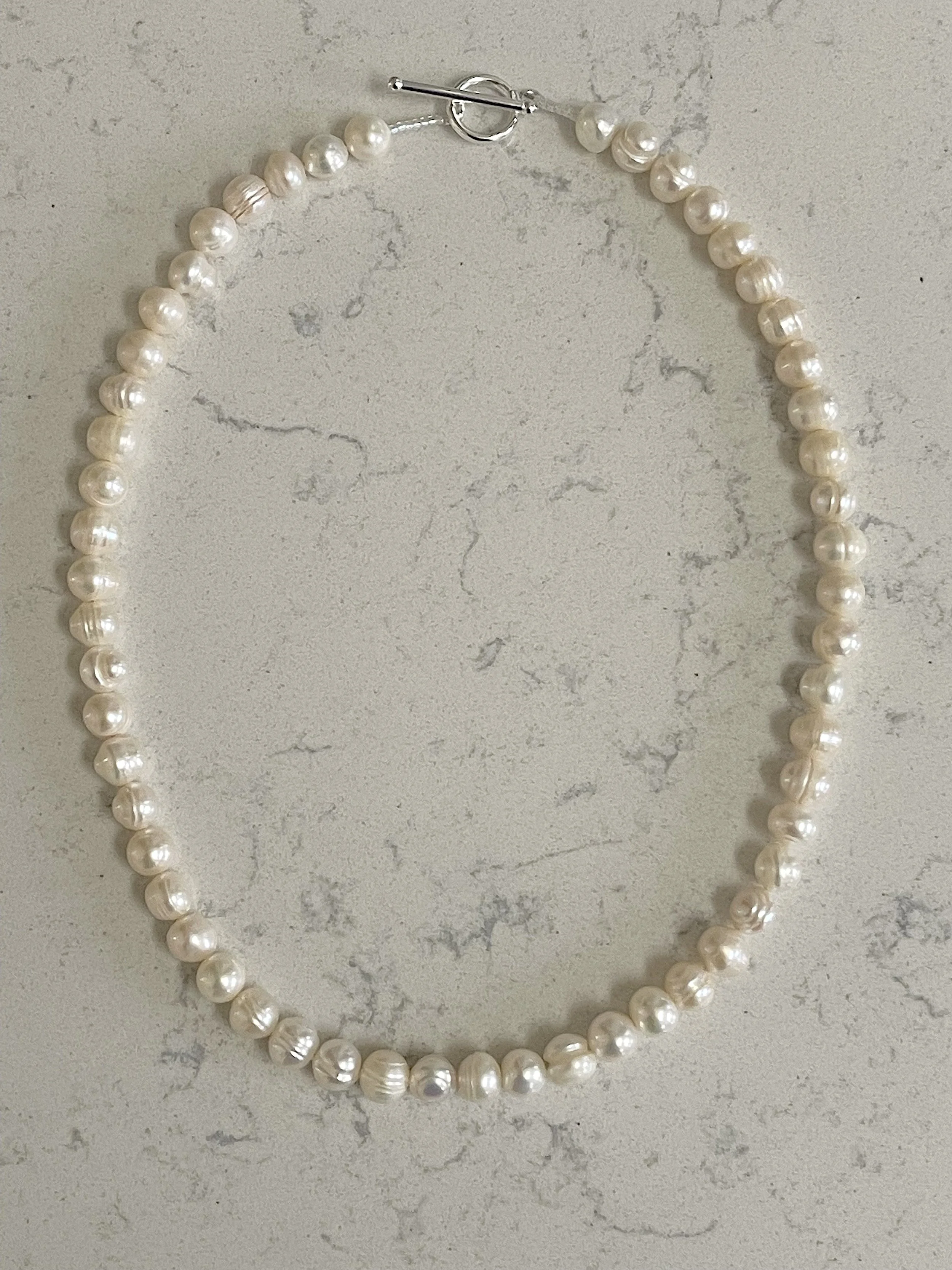 White Semi-Round Pearls .jpg