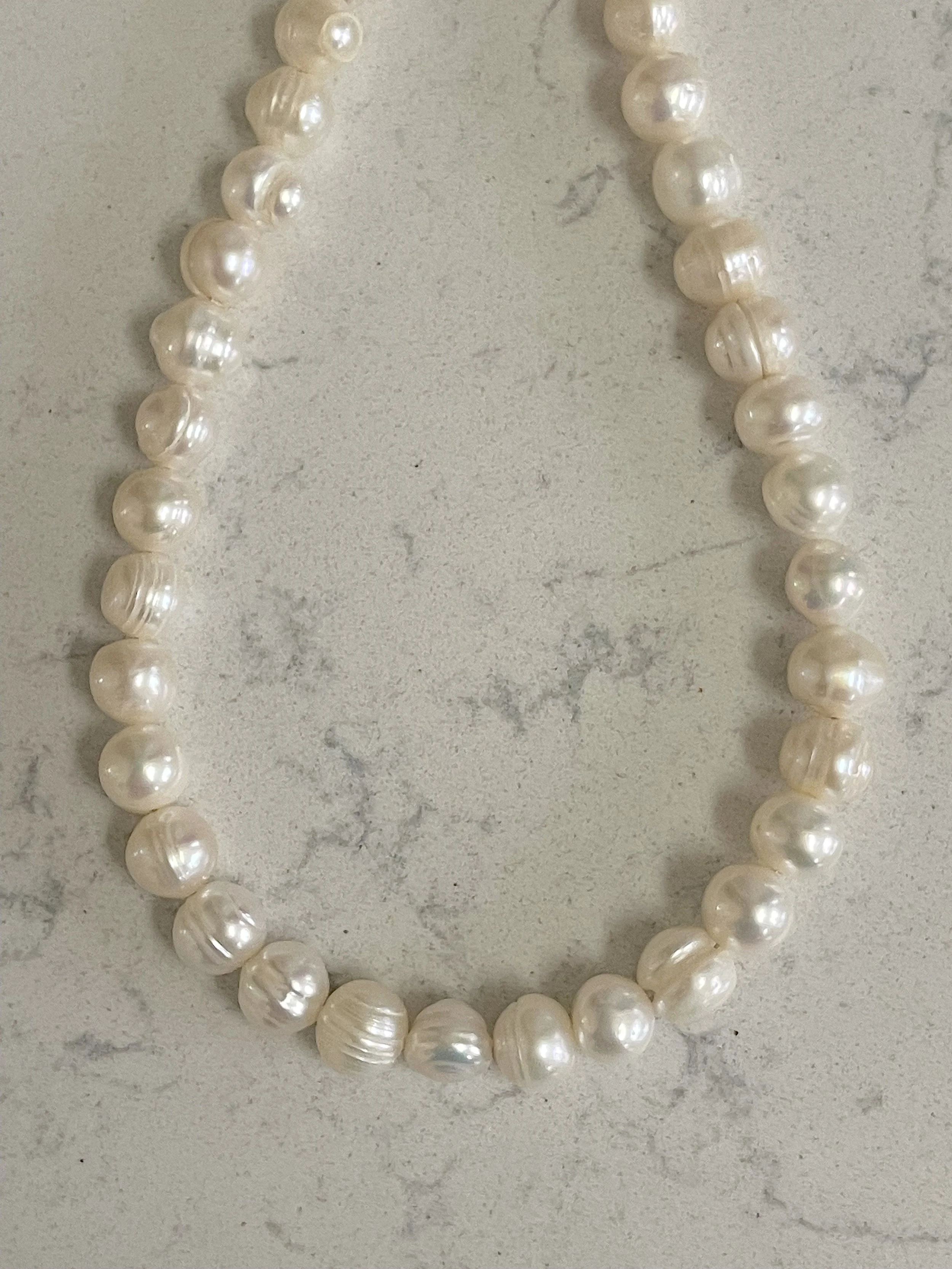 White Semi-Round Pearls closeup.jpg