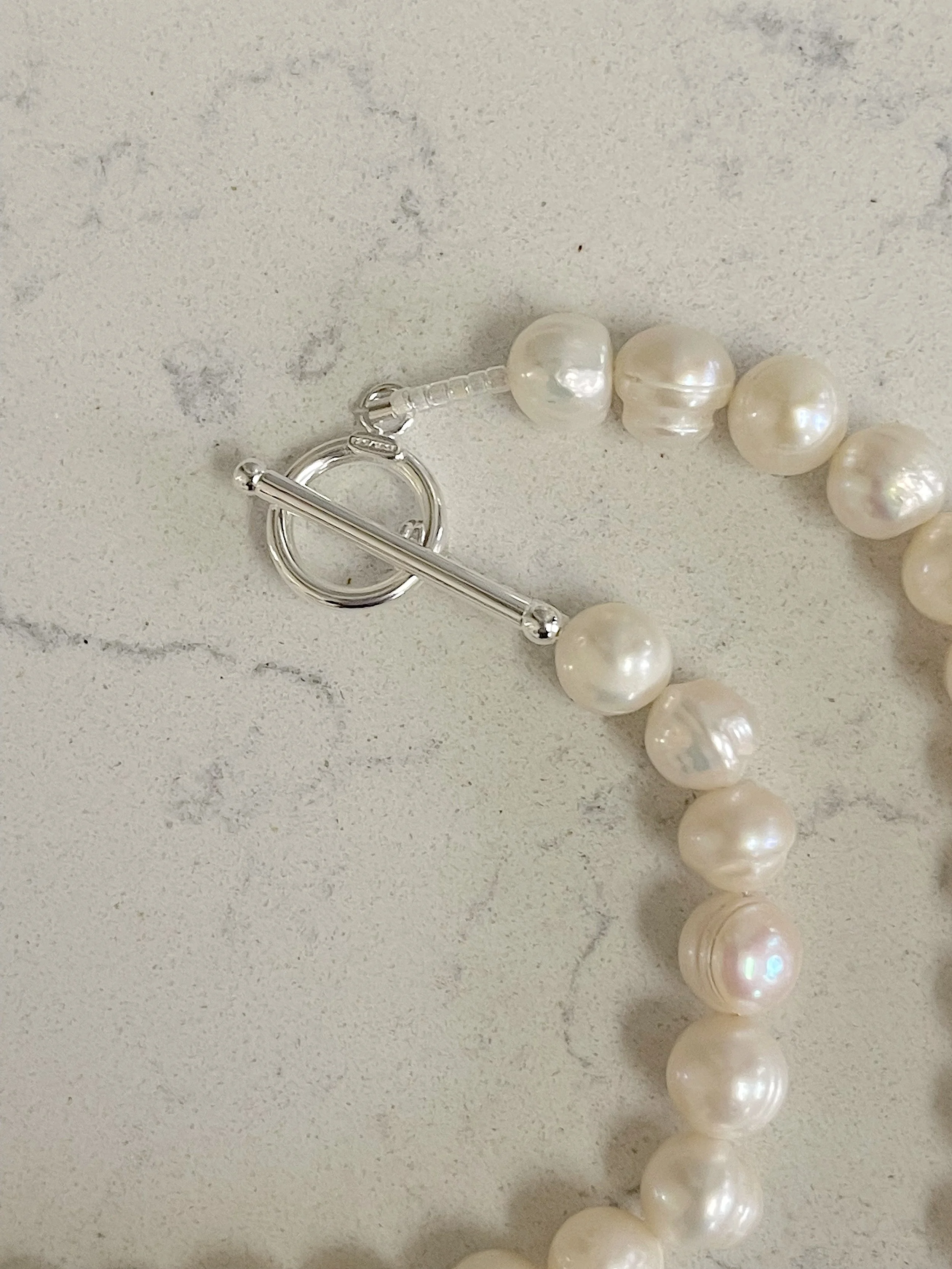 White Semi-Round Pearls clasp.jpg