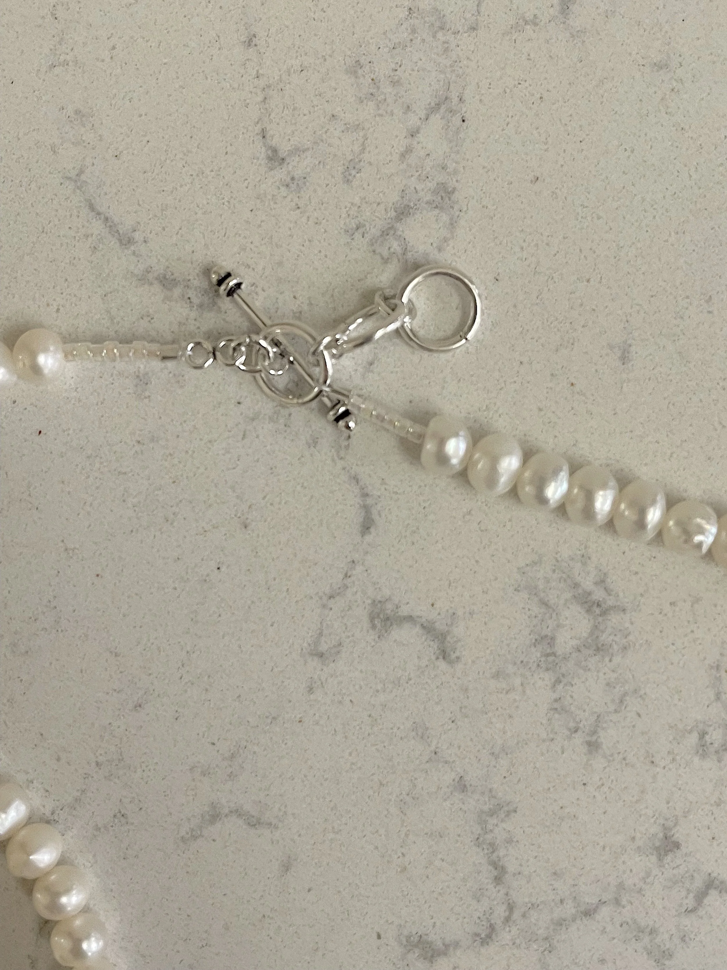 Cultured Semi-round pearls clasp.jpg