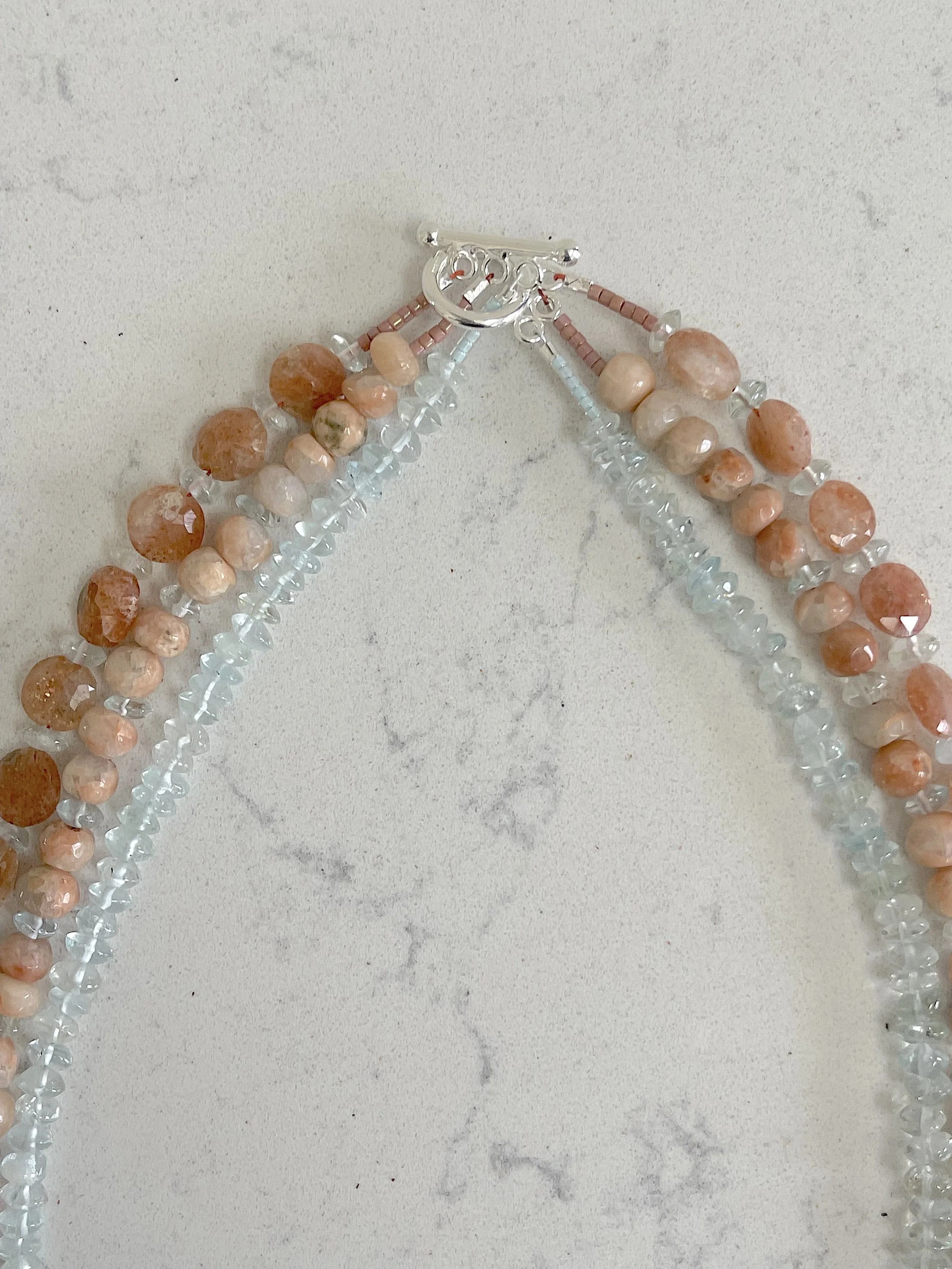 Cove Sunset necklace claps.jpg