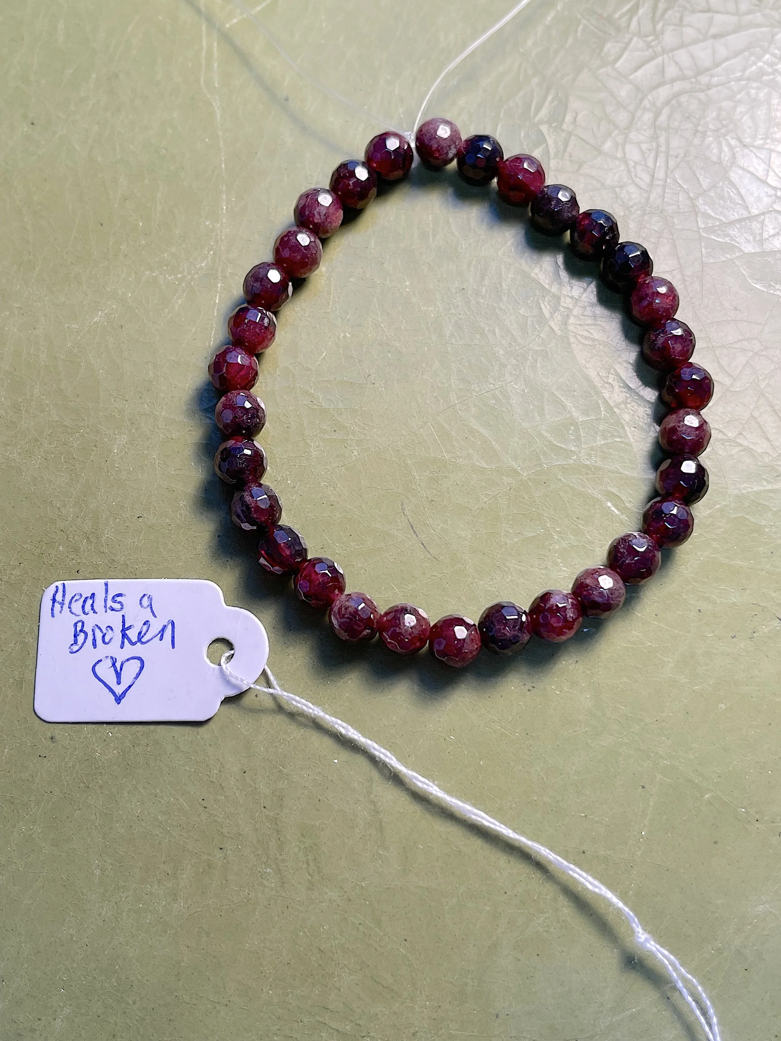 Faceted Garnet-Circulation and Heals a Broken Heart.jpg