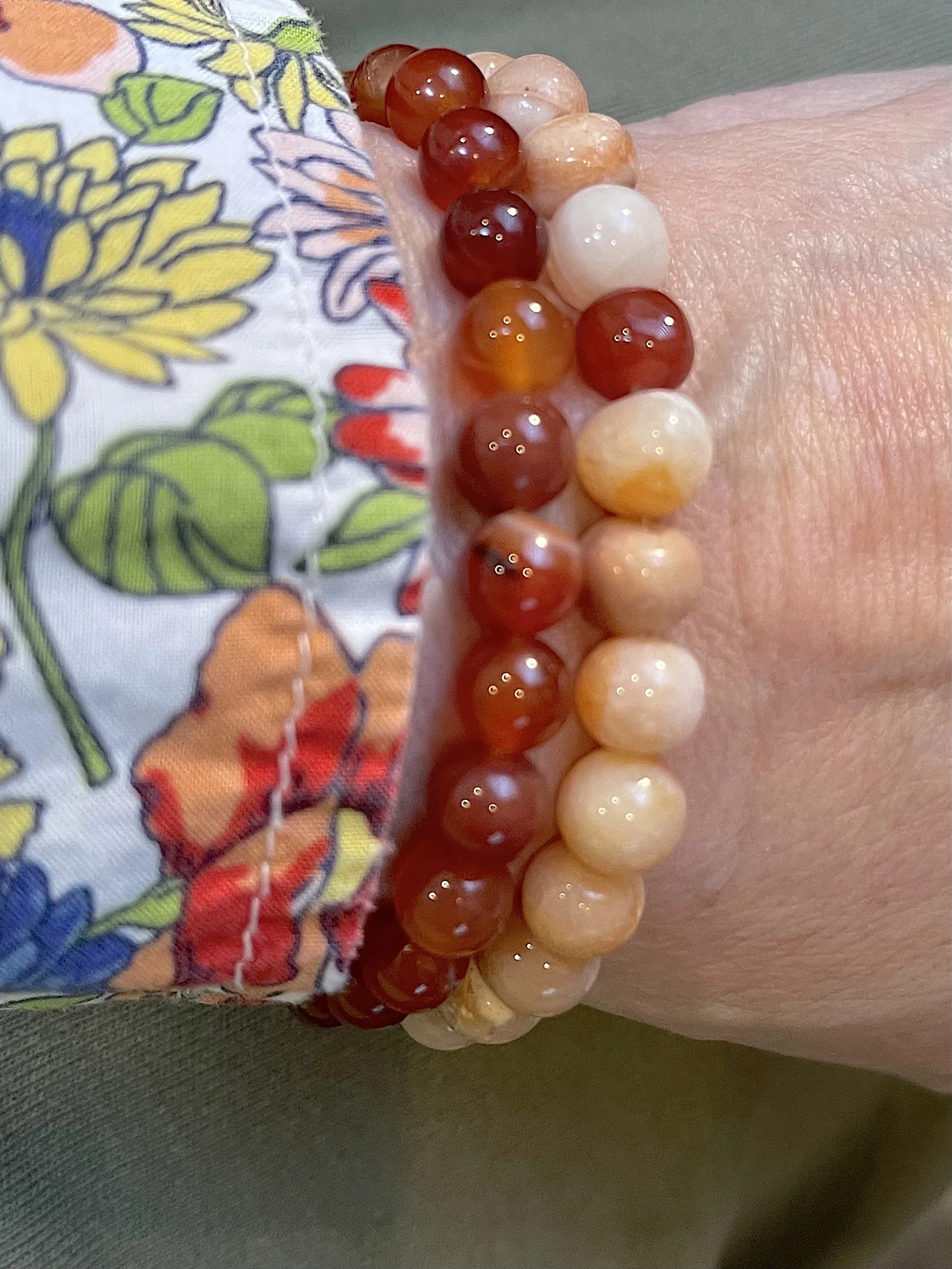 Red Agate and orange Agate energy bracelets.jpg