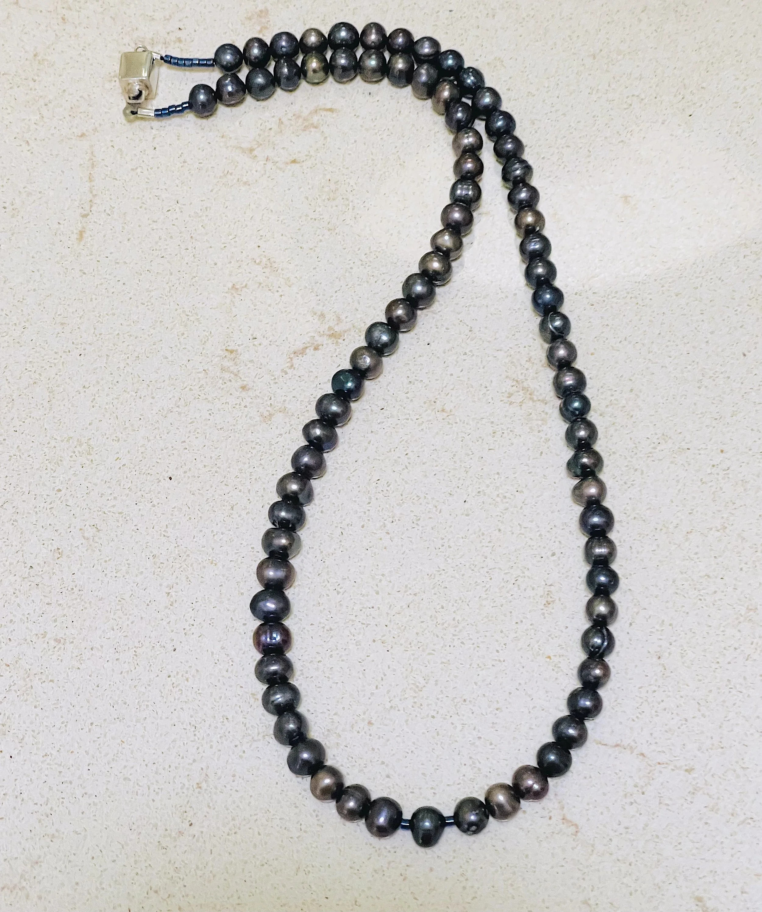 Peacock Pearls curved.jpg