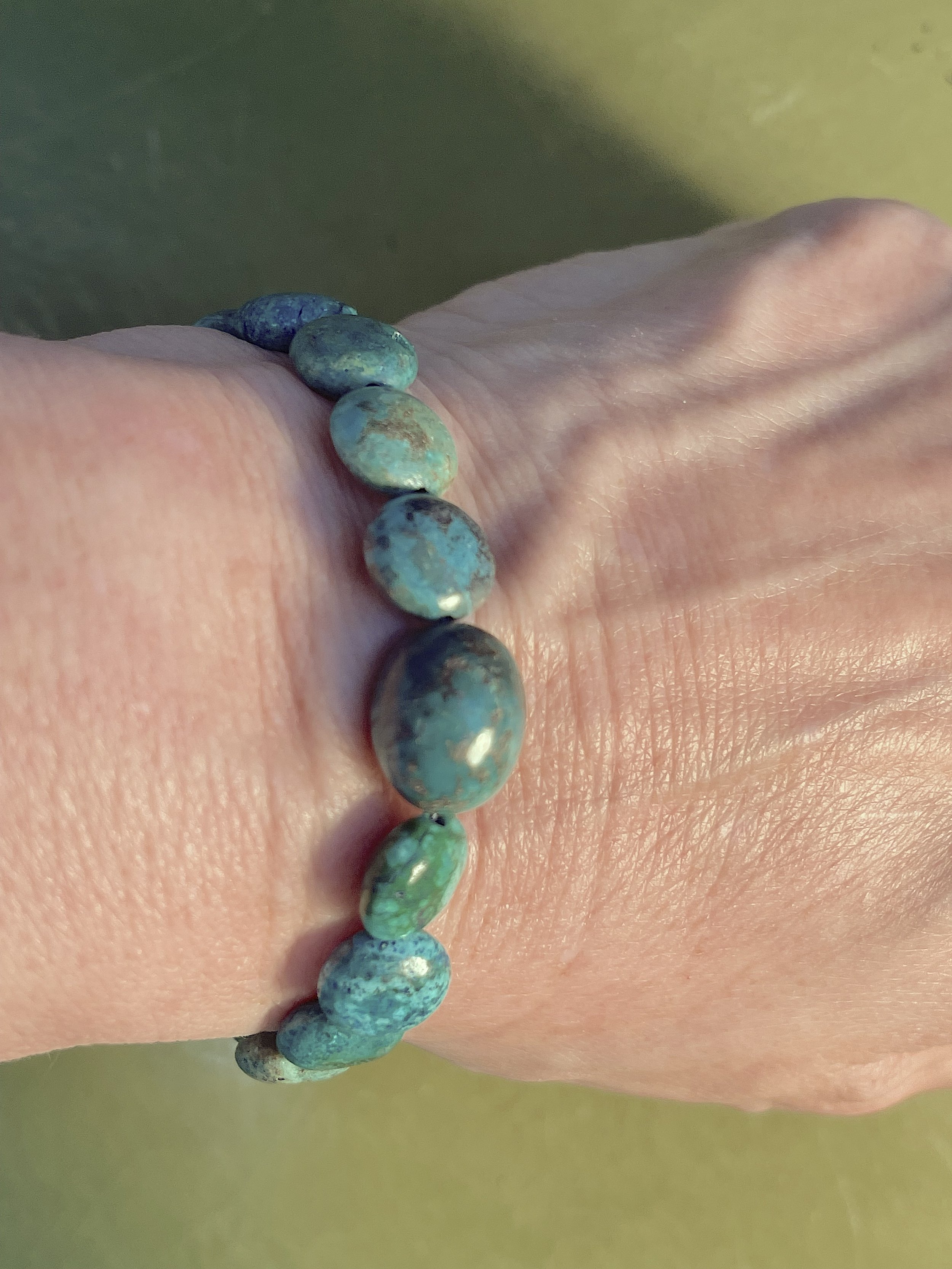 Turquoise disc bracelet on me.jpg