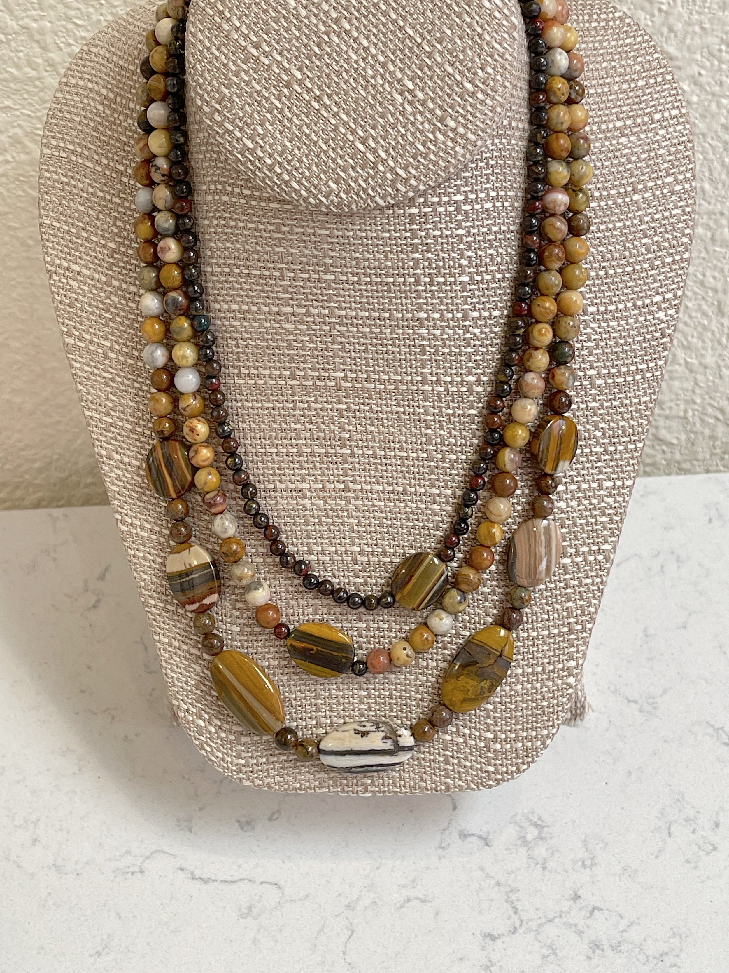 Tigers and a Zebra on stand.jpg