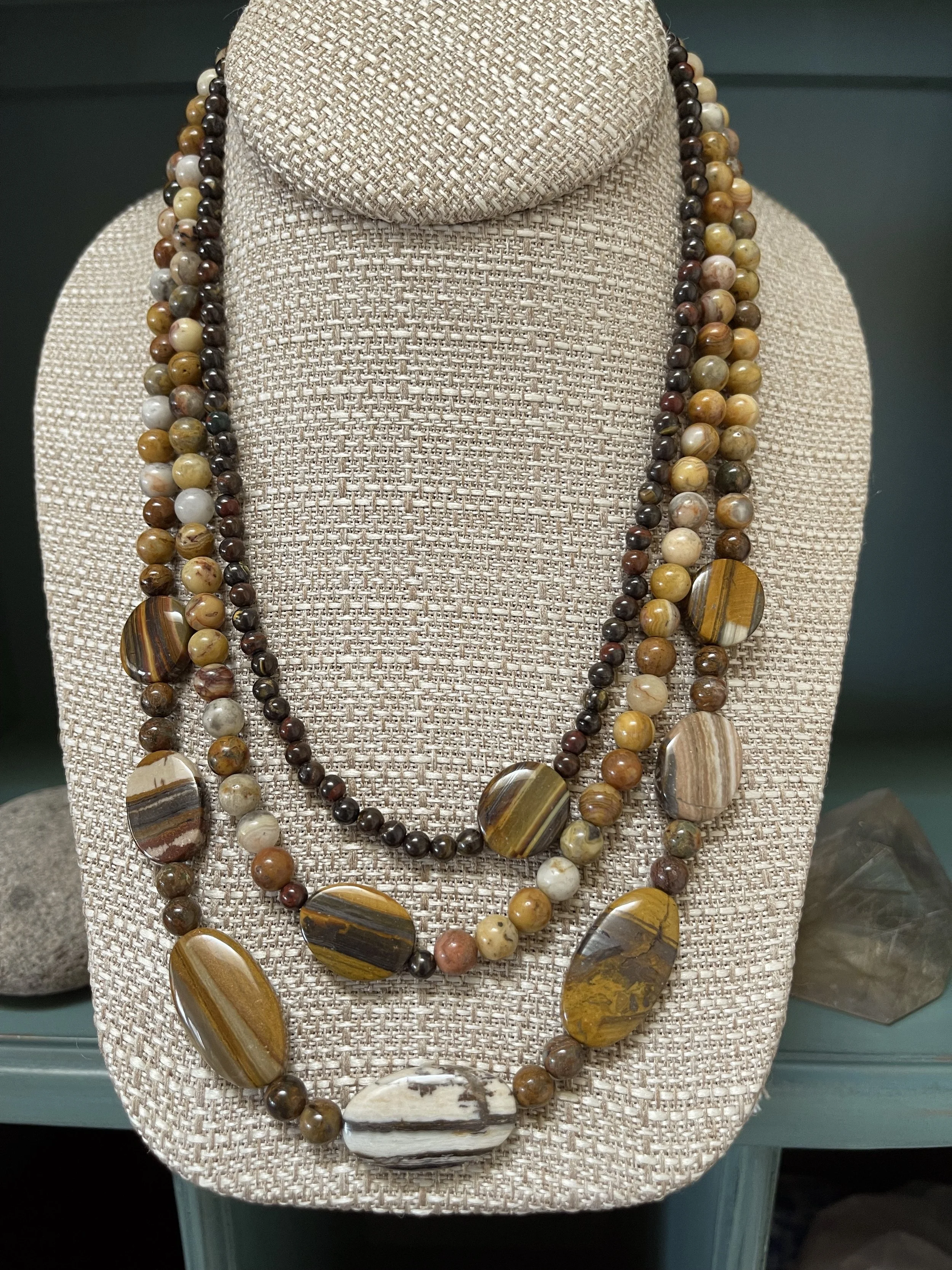 Tigers and a Zebra on shelf.jpg