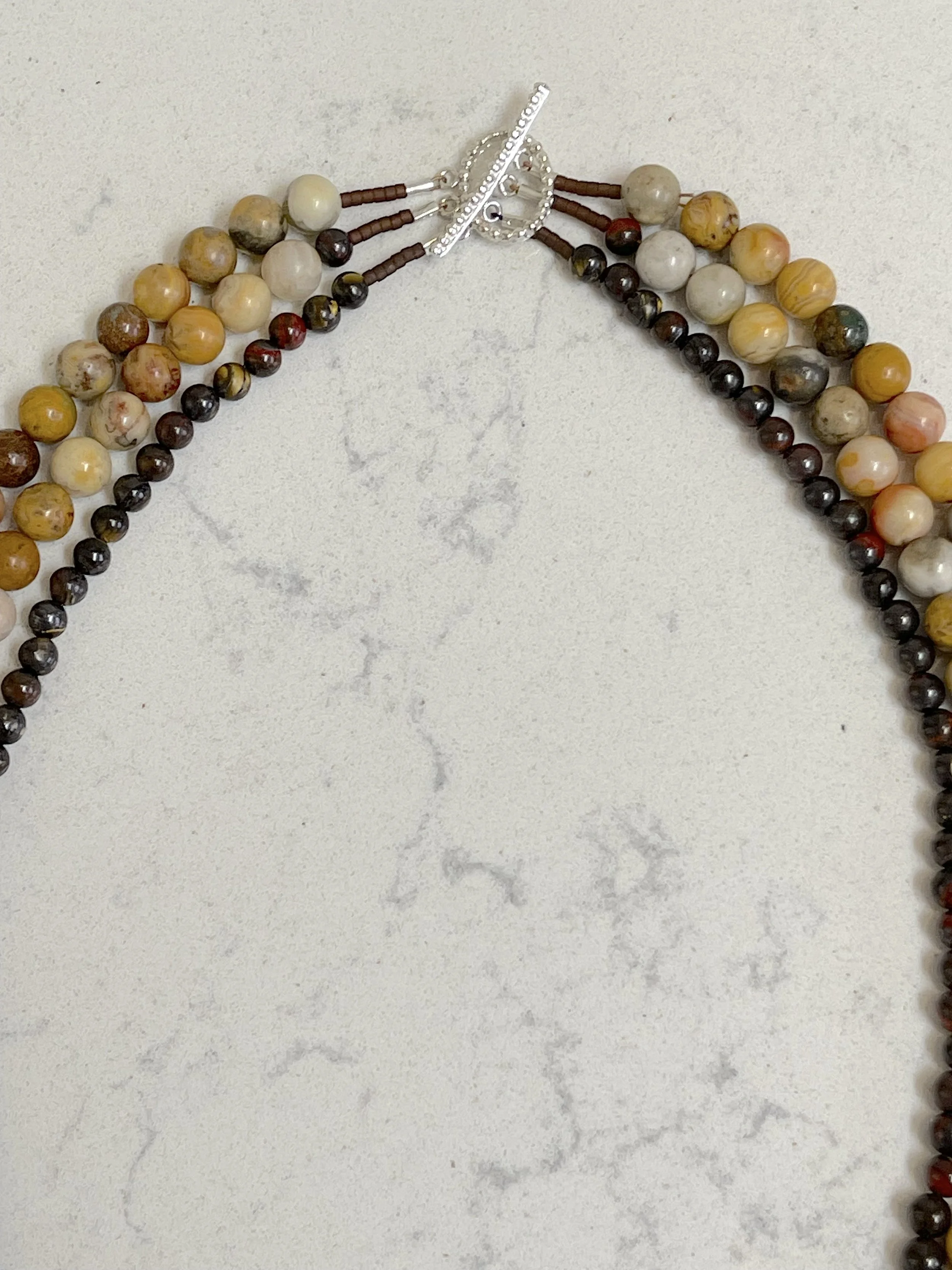 Tigers and a Zebra clasp.jpg